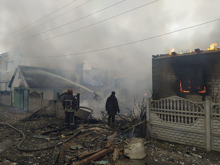 Firefighters try to extinguish a blaze in Chernihiv, Ukraine on March 5. 