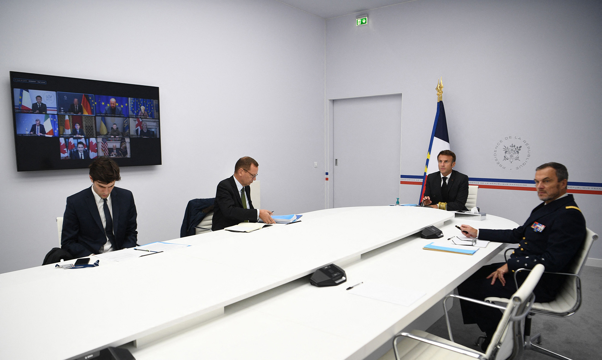 France's President Emmanuel Macron, second right, participates in a video conference with G7 leaders on the situation in Ukraine, at the Hotel Marigny in Paris, France, on October 11.