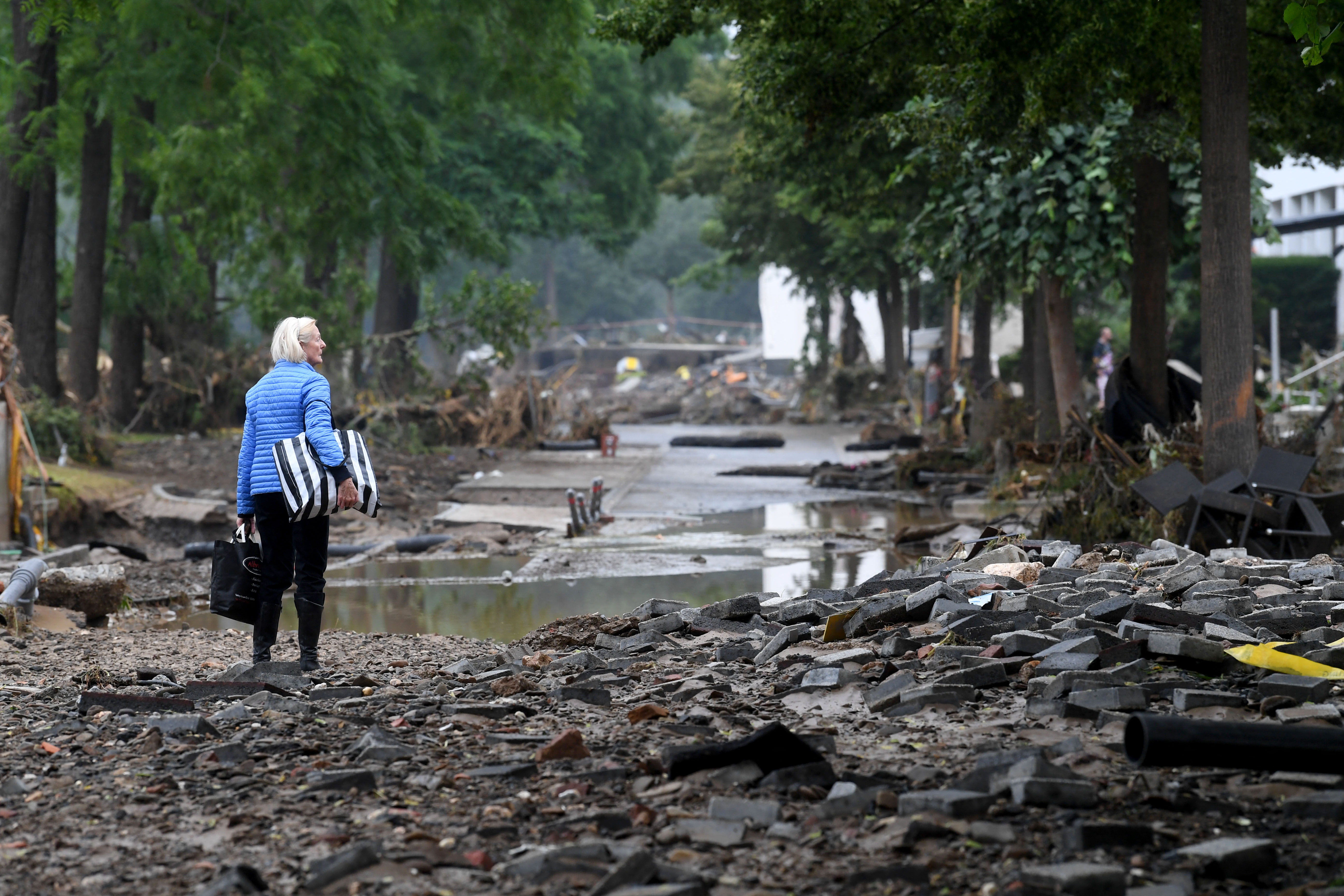 A devastating Flood. Devastated person.