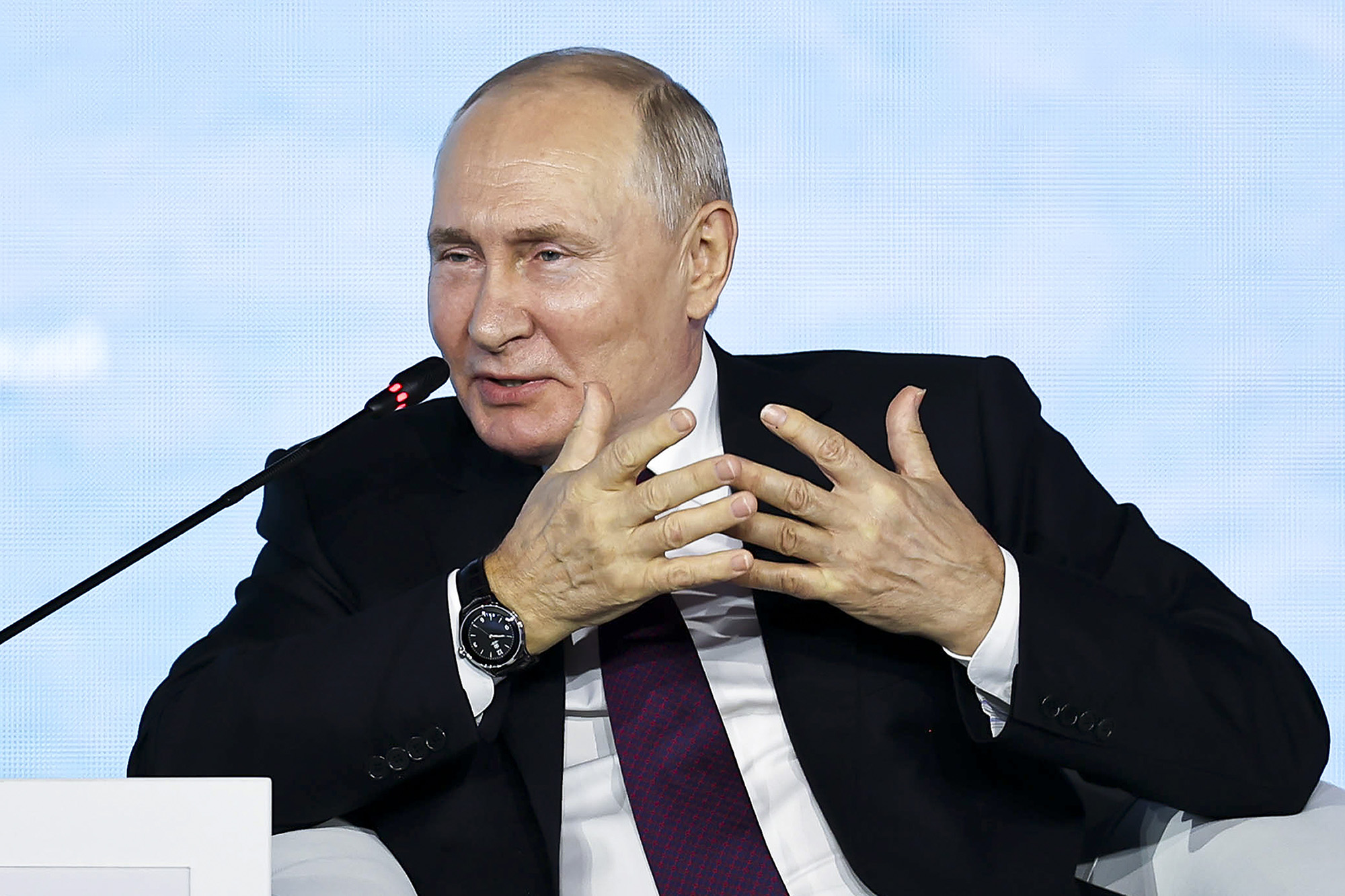 Russian President Vladimir Putin gestures while speaking at the Eastern Economic Forum in Vladivostok, Russia, on September 12.