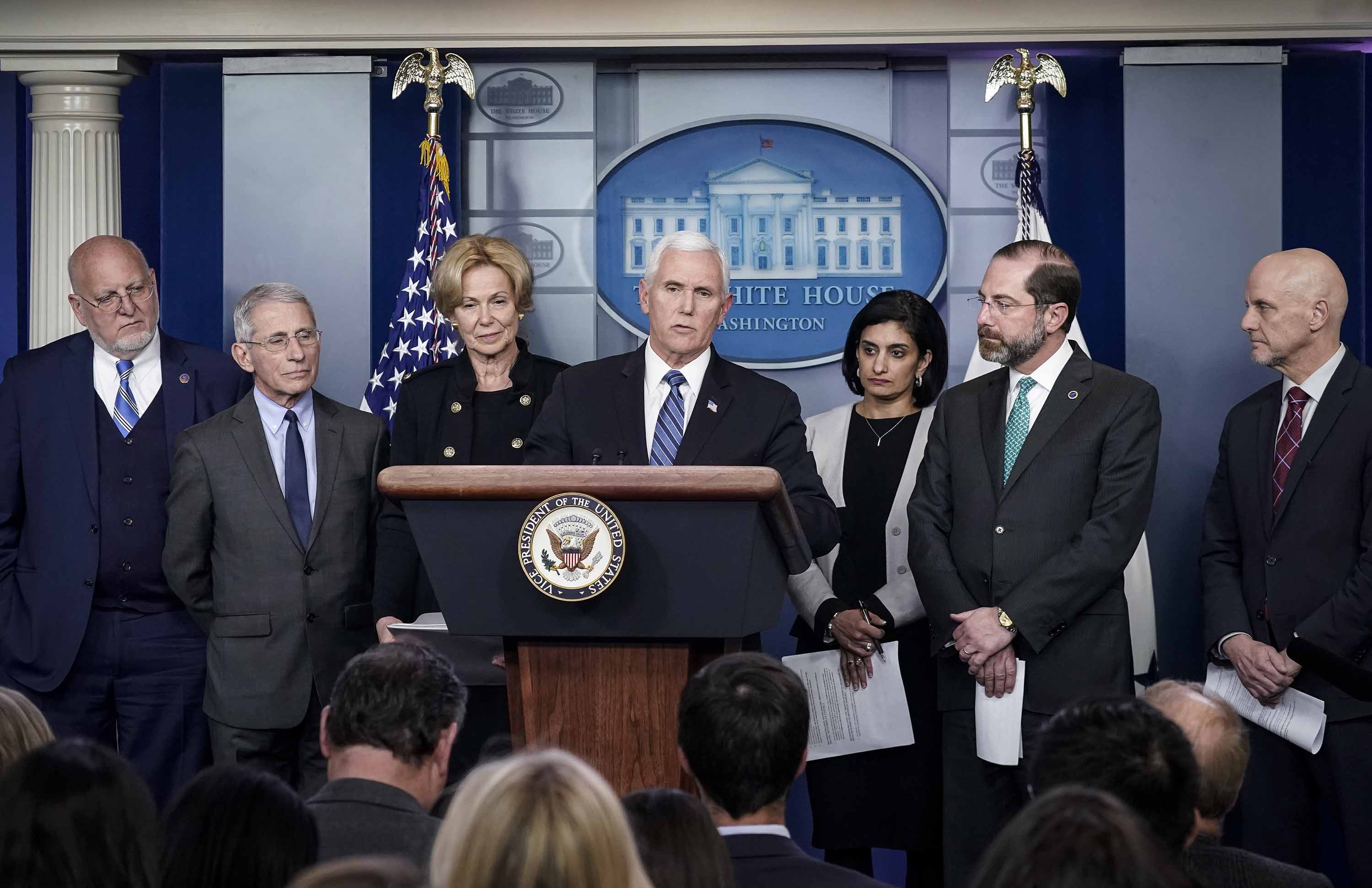 Vice President Mike Pence speaks during a briefing on the administration's coronavirus response at the White House on March 2. Standing with Pence, from left: Dr. Robert Redfield, Director of the US Centers for Disease Control and Prevention; Dr. Anthony Fauci, Director of the National Institute of Allergy and Infectious Diseases; Dr. Deborah Birx, White House Coronavirus Response Coordinator; Seema Verma, administrator of the Centers for Medicare and Medicaid Services; Alex Azar, Secretary of Health and Human Services; and Stephen Hahn, commissioner of food and drugs at the US Food and Drug Administration.