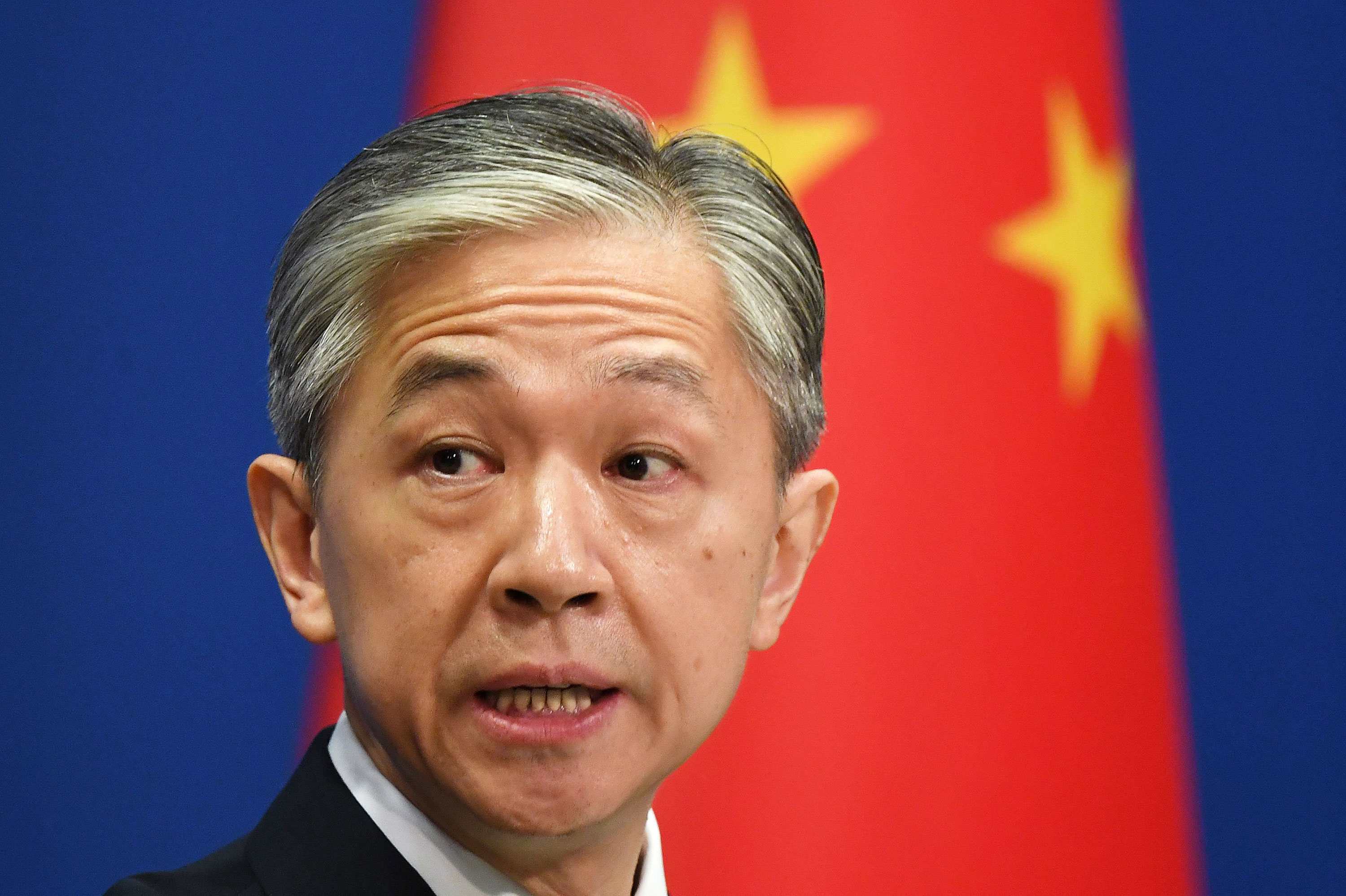 Chinese Foreign Ministry spokesman Wang Wenbin speaks at a daily briefing on July 24 in Beijing.