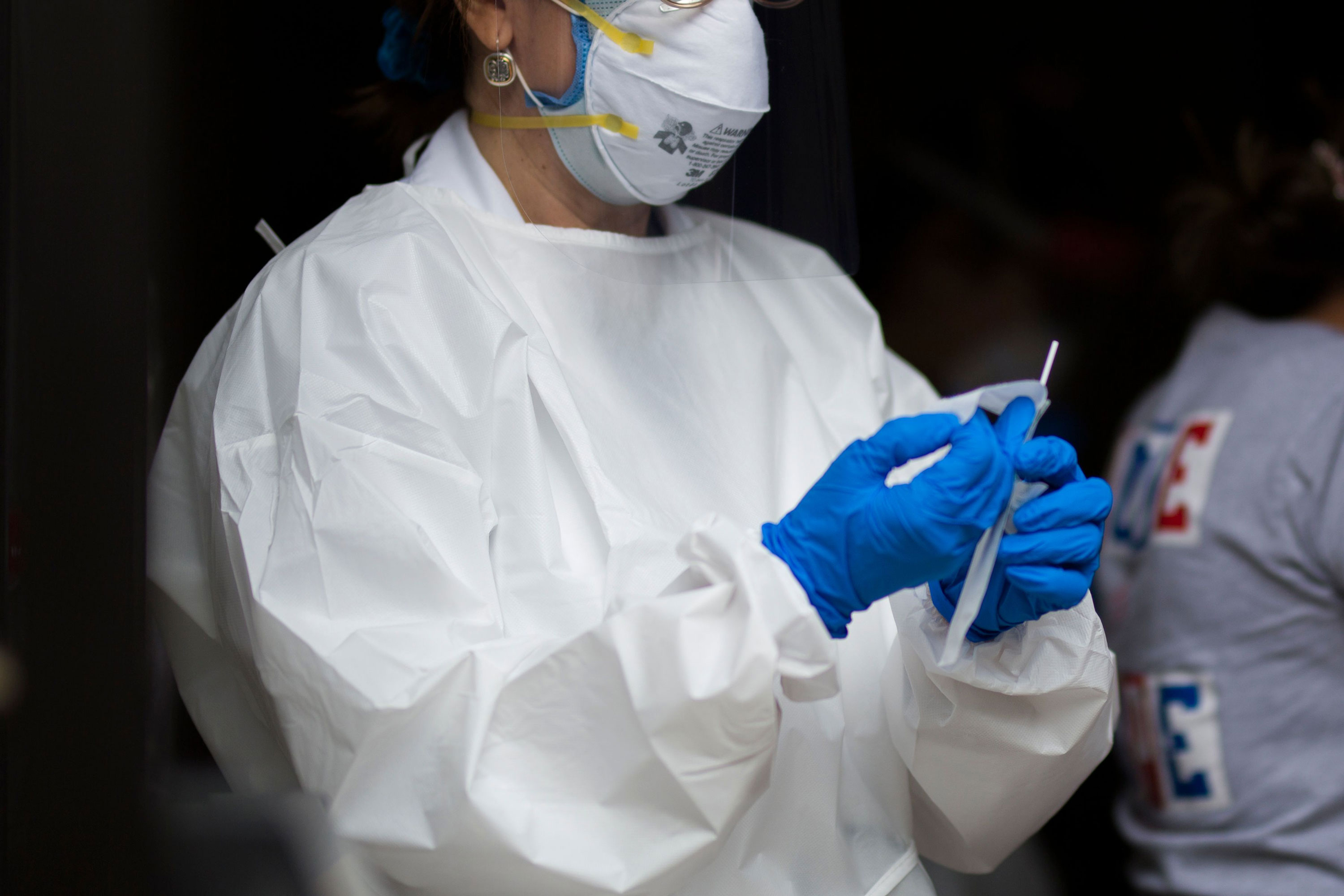 A medical worker prepares a Covid-19 test swab at Hope Clinic in Houston, Texas, on May 21. 