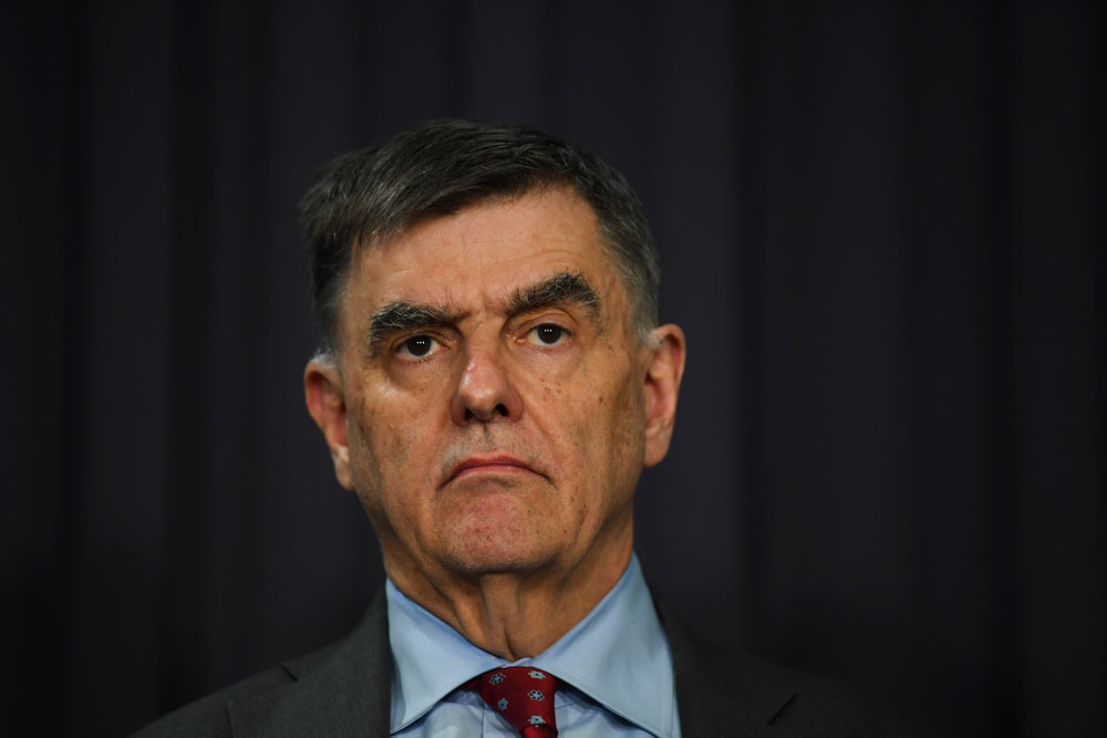 Australia's Chief Medical Officer Brendan Murphy addresses the media and the nation during a news conference at Parliament House on March 24 in Canberra, Australia. 