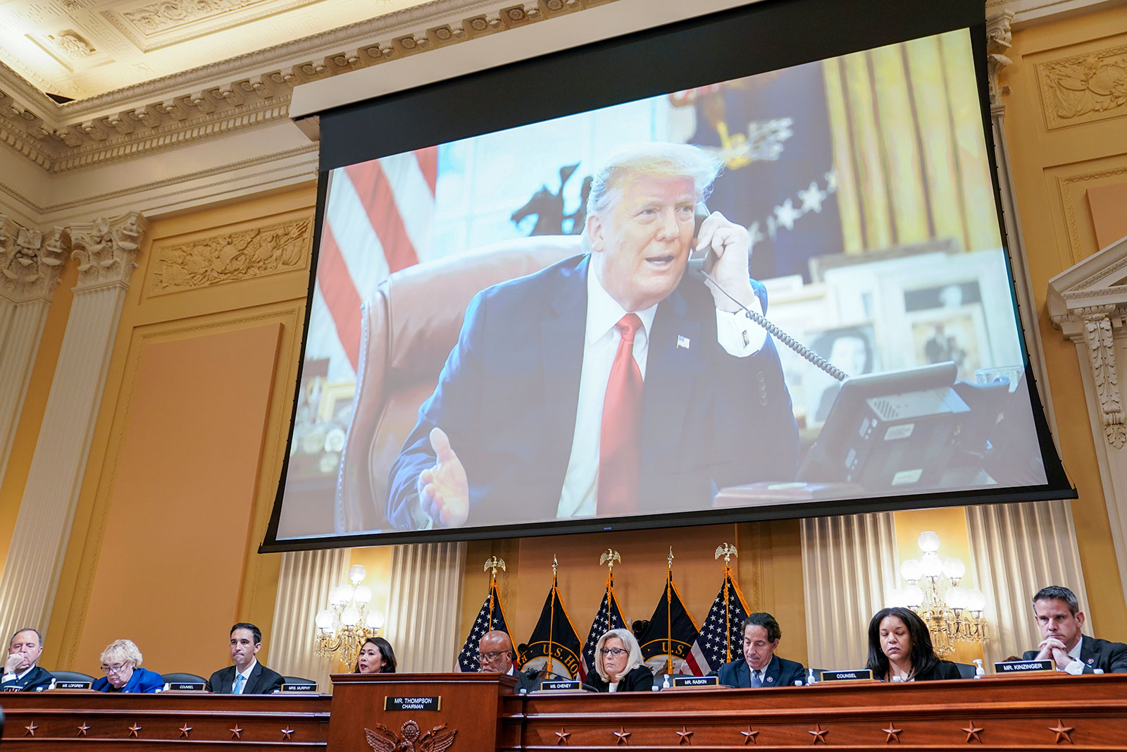 A visual of former President Donald Trump is shown at the House select committee's public hearing on July 12.