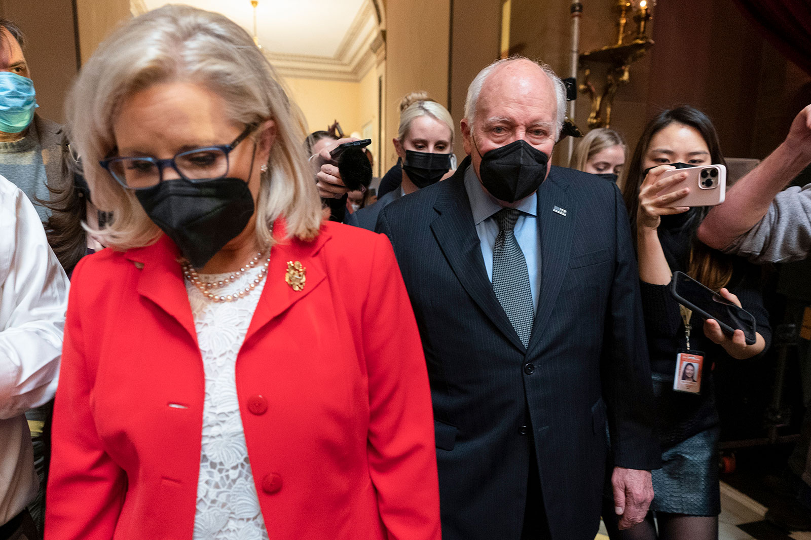 Wyoming Rep. Liz Cheney and former Republican Vice President Dick Cheney walk through the US Capitol on Thursday.