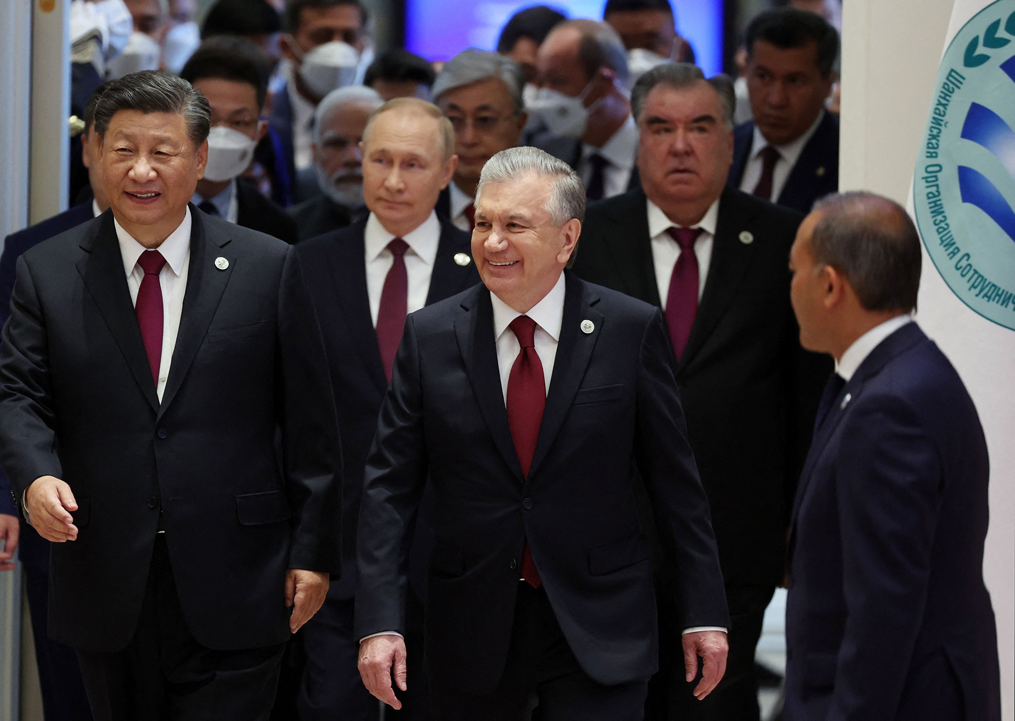 China's President Xi Jinping, Russian President Vladimir Putin, Uzbek President Shavkat Mirziyoyev and other participants attend the Shanghai Cooperation Organisation (SCO) leaders' summit in Samarkand on September 16.