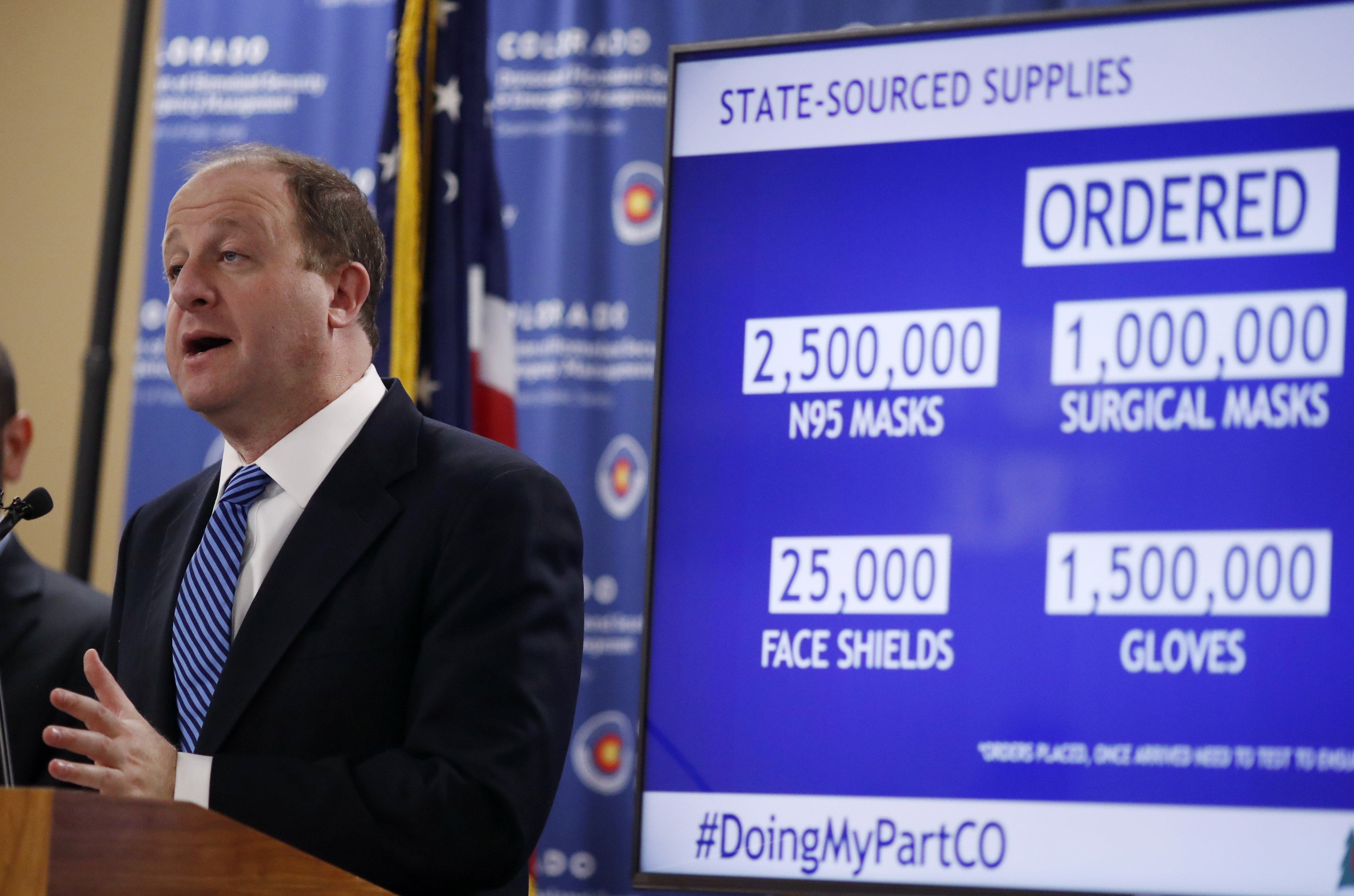 Colorado Gov. Jared Polis speaks at a news conference in Centennial, Colorado, on Wednesday, April 1.