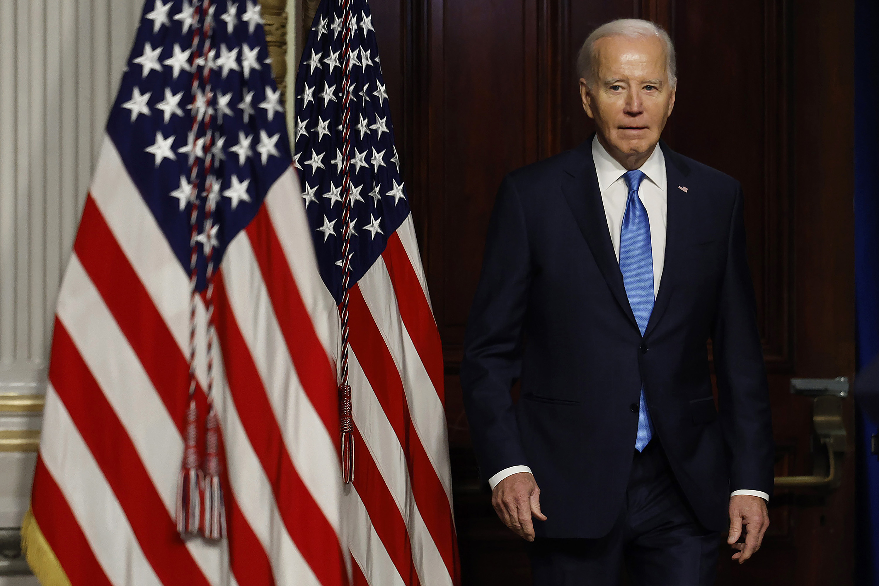 US President Joe Biden arrives for a meeting in Washington, DC, on December 13, 2023.