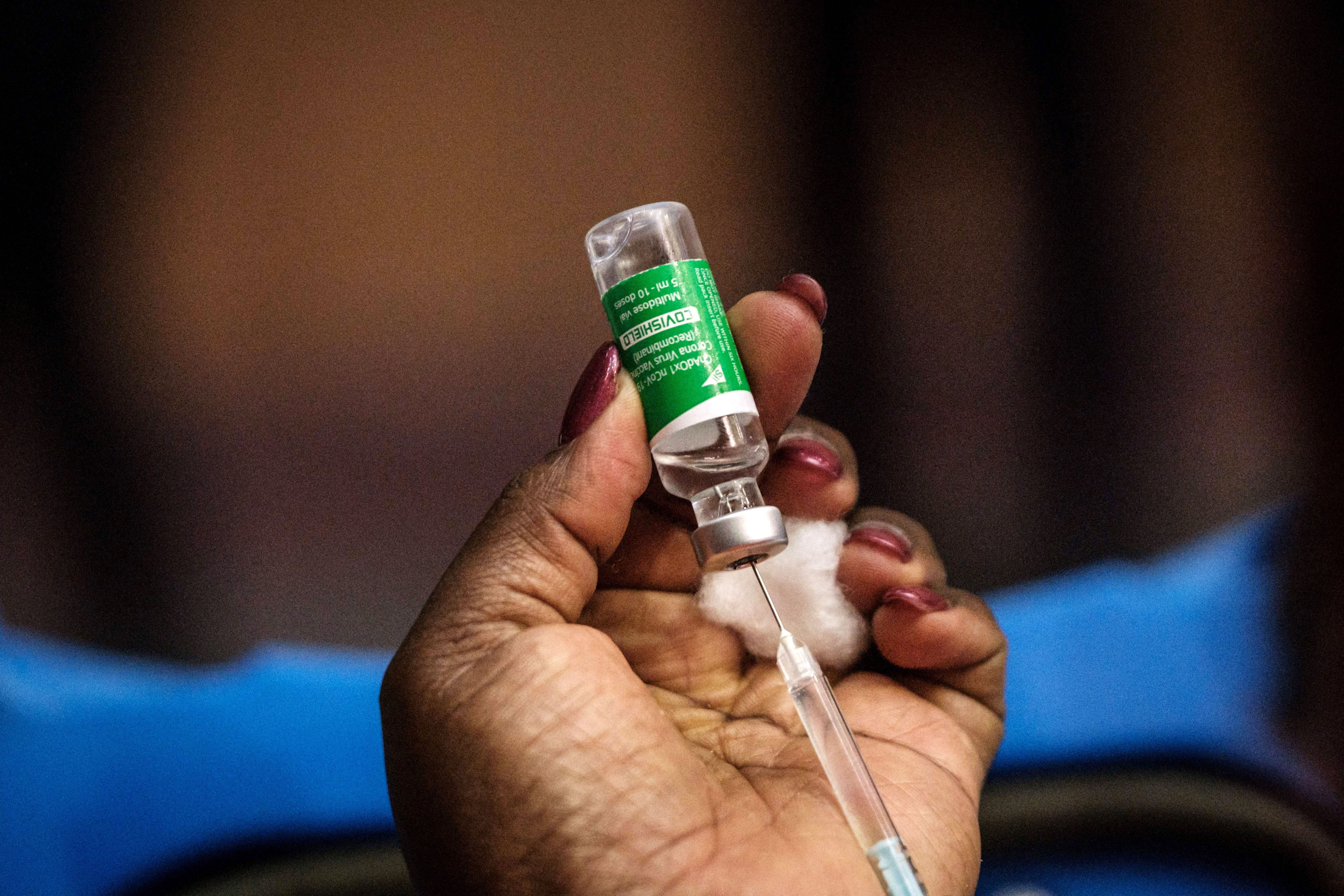 A nurse prepares a Covid-19 vaccine dose in Nairobi, Kenya, on April 21.