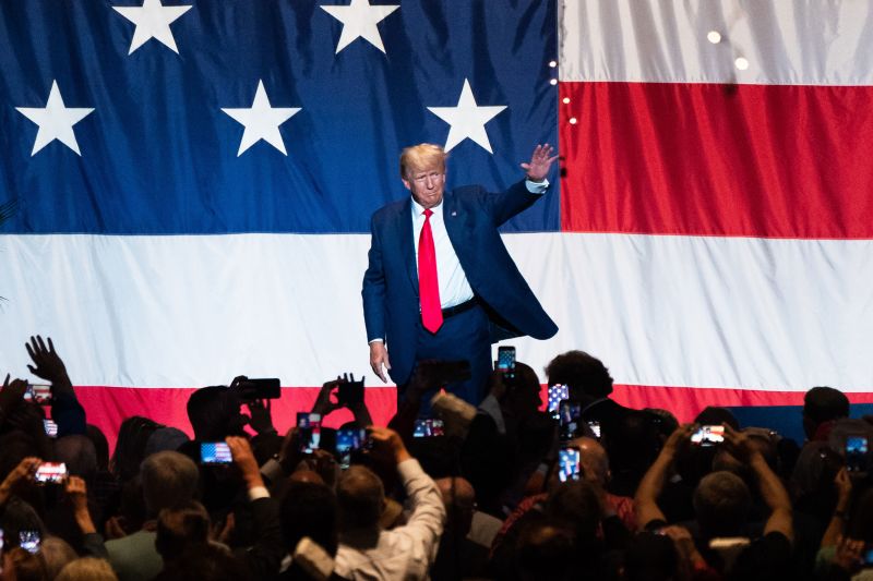 Former President Donald Trump waves to attendees after speaking at the Georgia GOP convention in Columbus on June 10. 