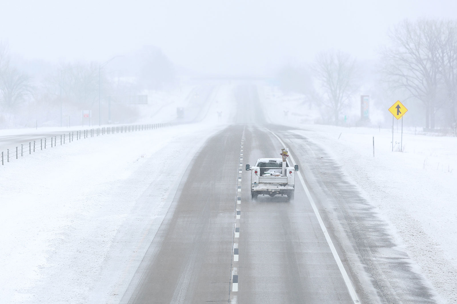 A vehicle drives on I-80 on Tuesday in Des Moines, Iowa. 