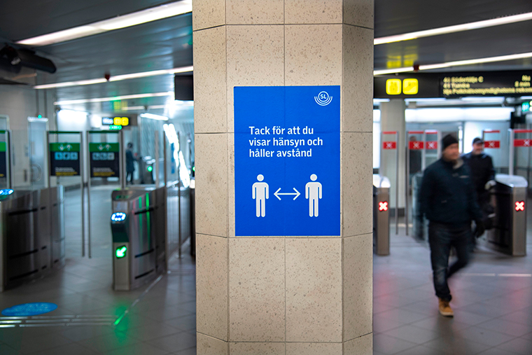 Travelers are seen at a public transport station in Stockholm, Sweden on November 4, 2020.