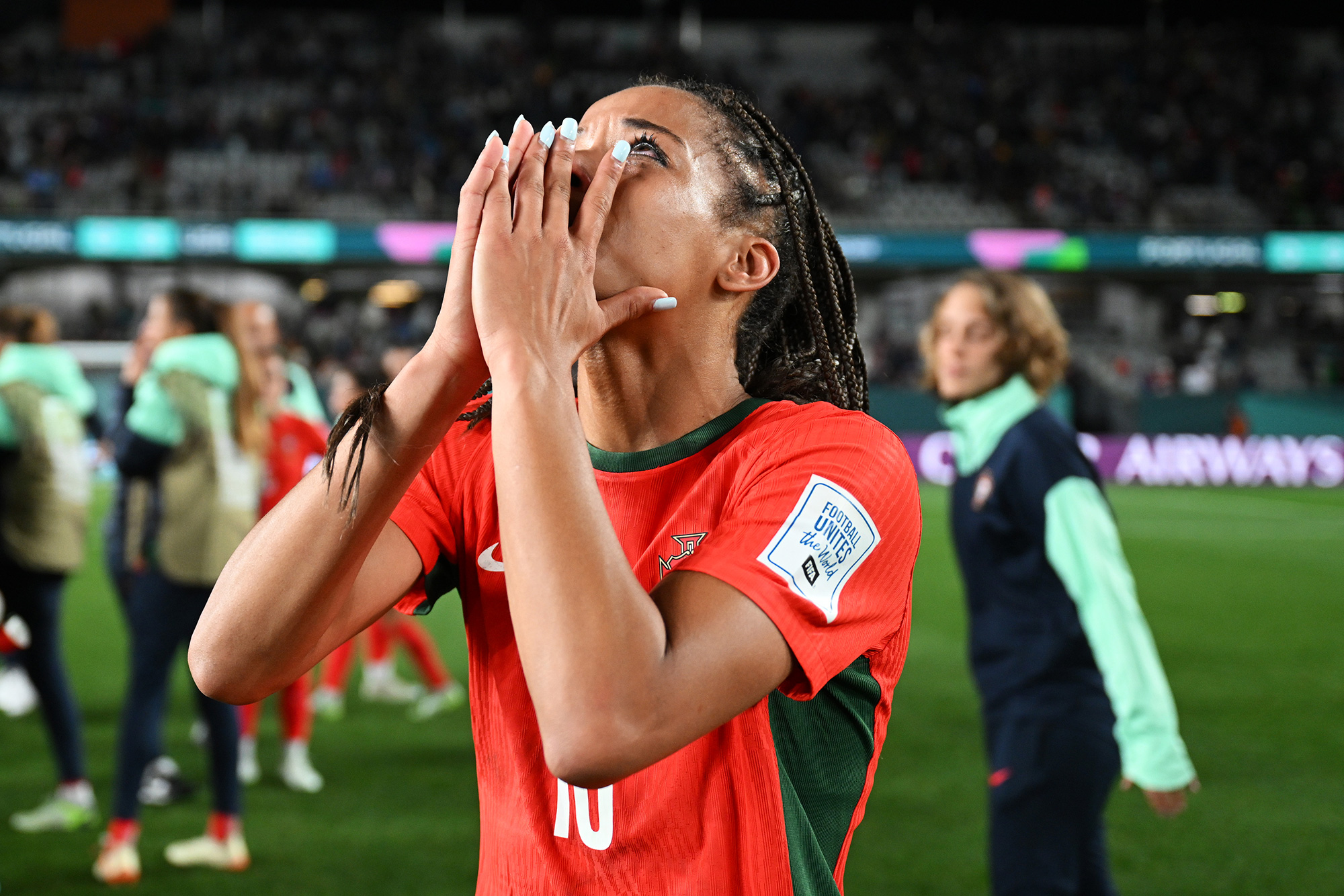 Jessica Silva of Portugal shows emotion after her team's elimination from the tournament in Auckland, New Zealand, on August 01.