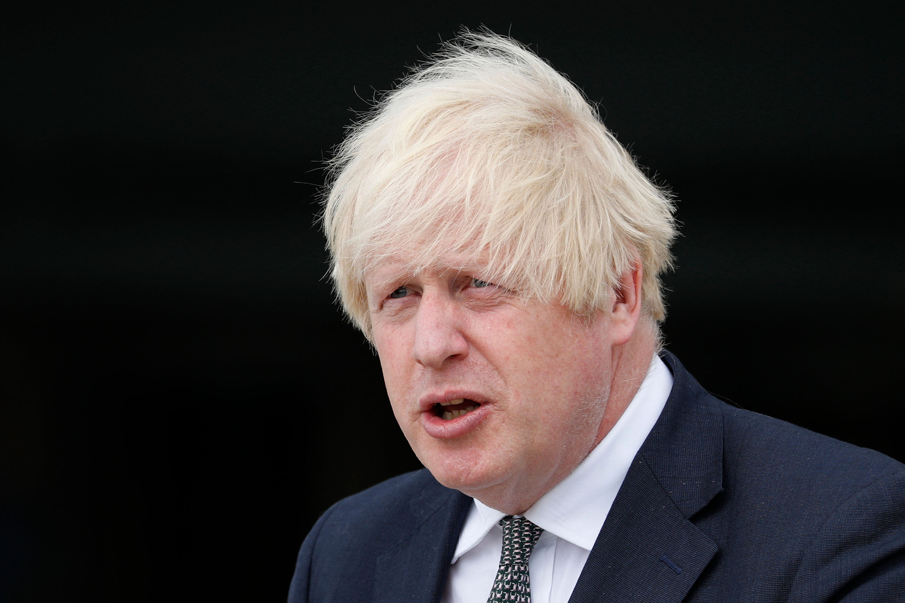 Britain's Prime Minister Boris Johnson is seen during a visit to Northwood Headquarters, the British Armed Forces Permanent Joint Headquarters, in Eastbury, England, on August 26. 