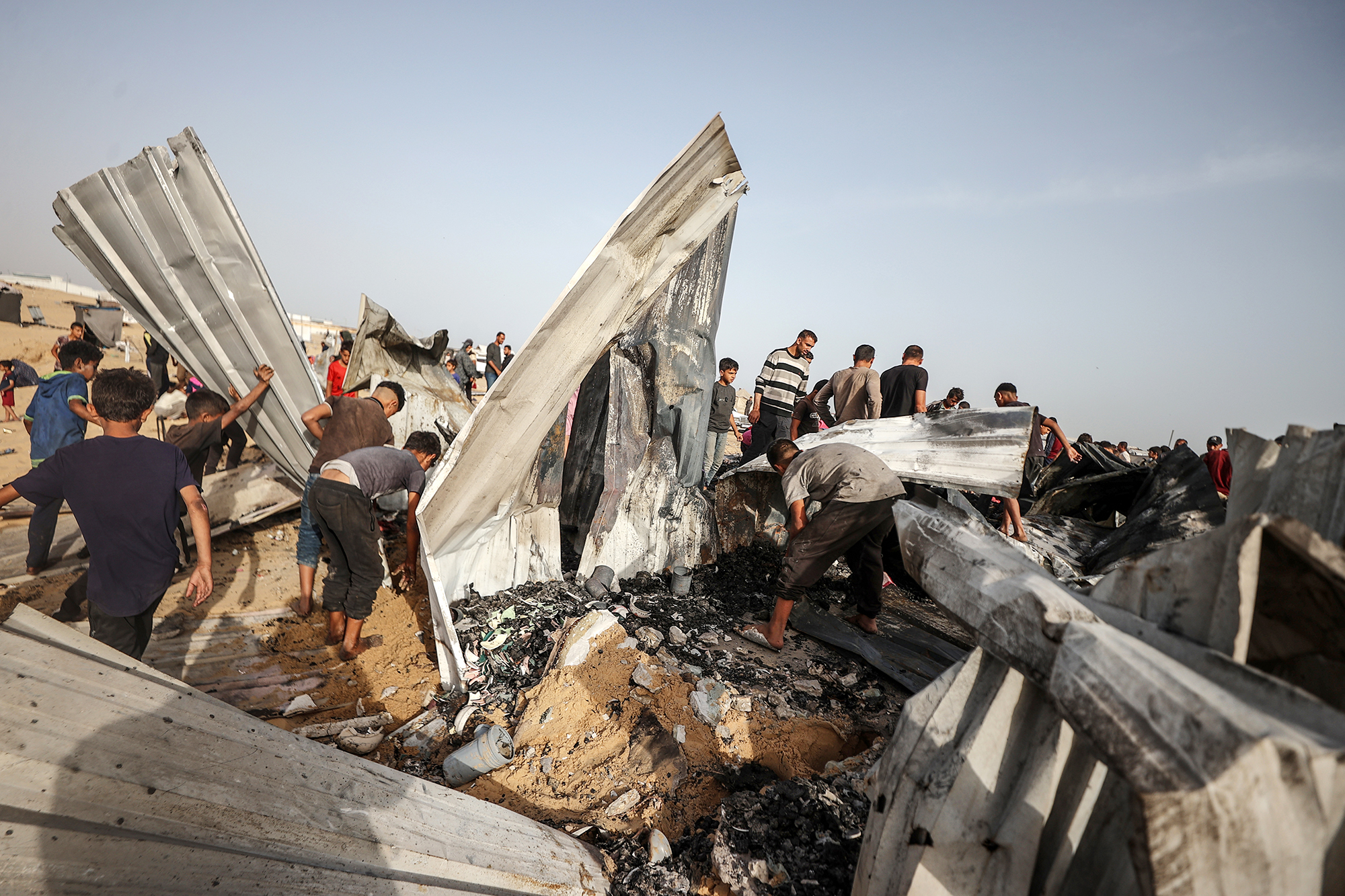 Palestinians at the scene of an Israeli attack in Rafah, Gaza, on May 27.