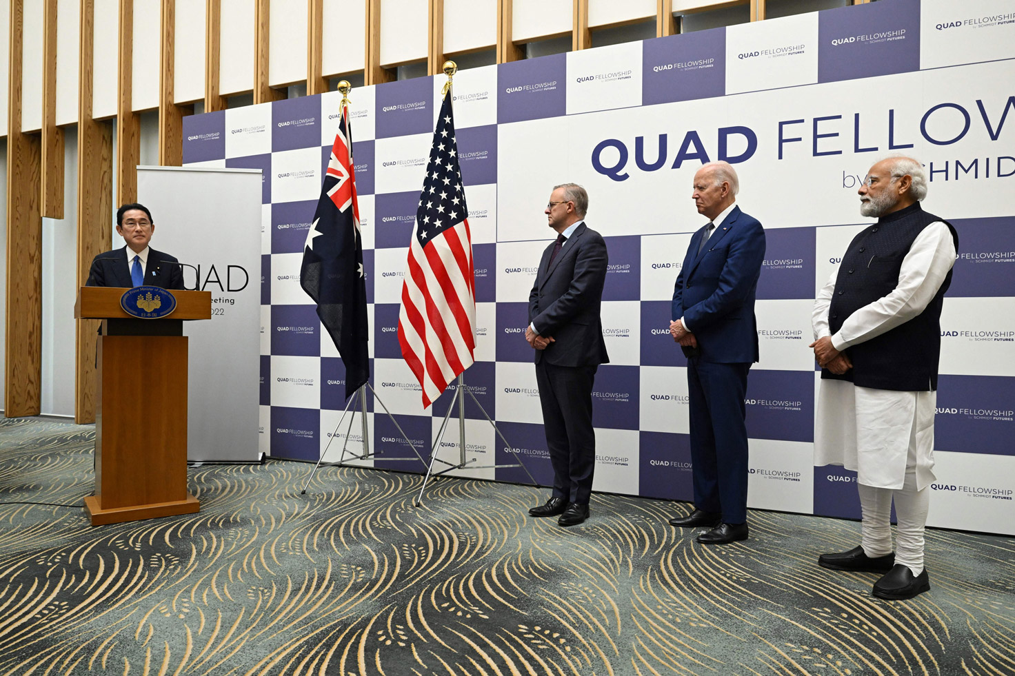 US President Joe Biden, Indian Prime Minister Narendra Modi and Australian Prime Minister Anthony Albanese listen to Japanese Prime Minister Fumio Kishida announce the Quad Fellowship, during the Quad Leaders Summit in Tokyo, on Tuesday.