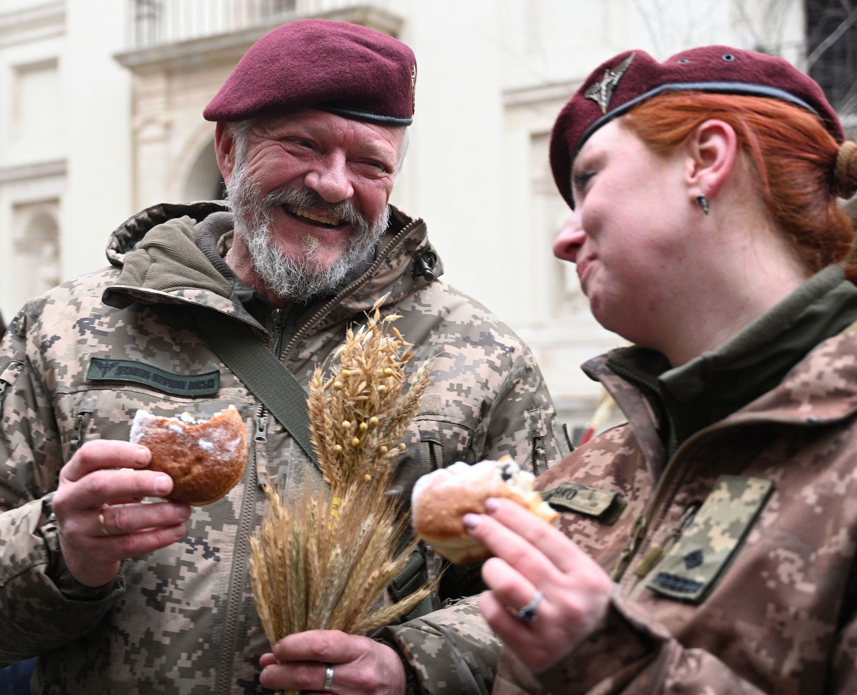 Ukrainian servicepeople take part in Orthodox Christmas Eve celebrations in Lviv on Friday. 