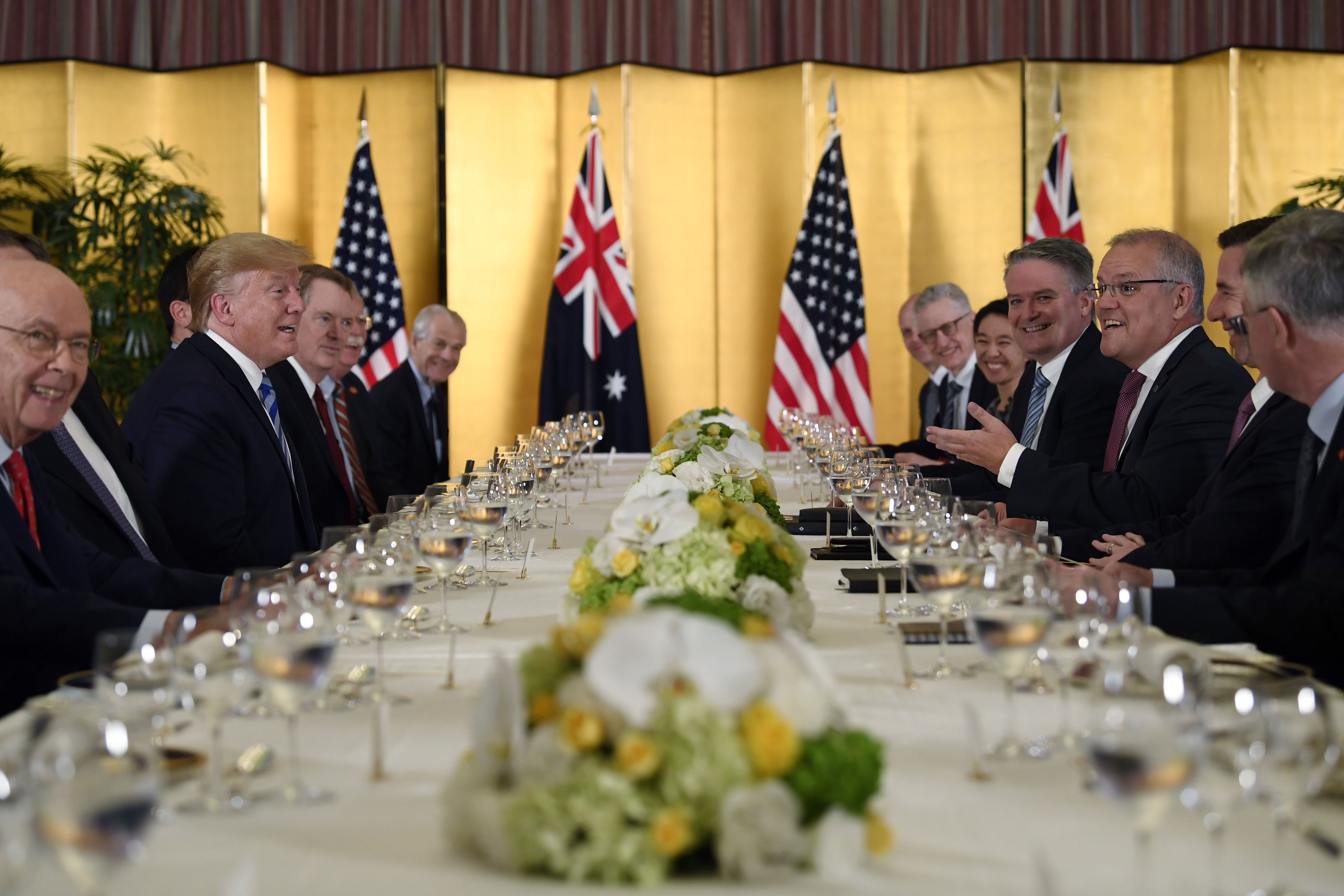 President Donald Trump attends dinner with Australian Prime Minister Scott Morrison, third from right, in Osaka, Japan, on Thursday night.