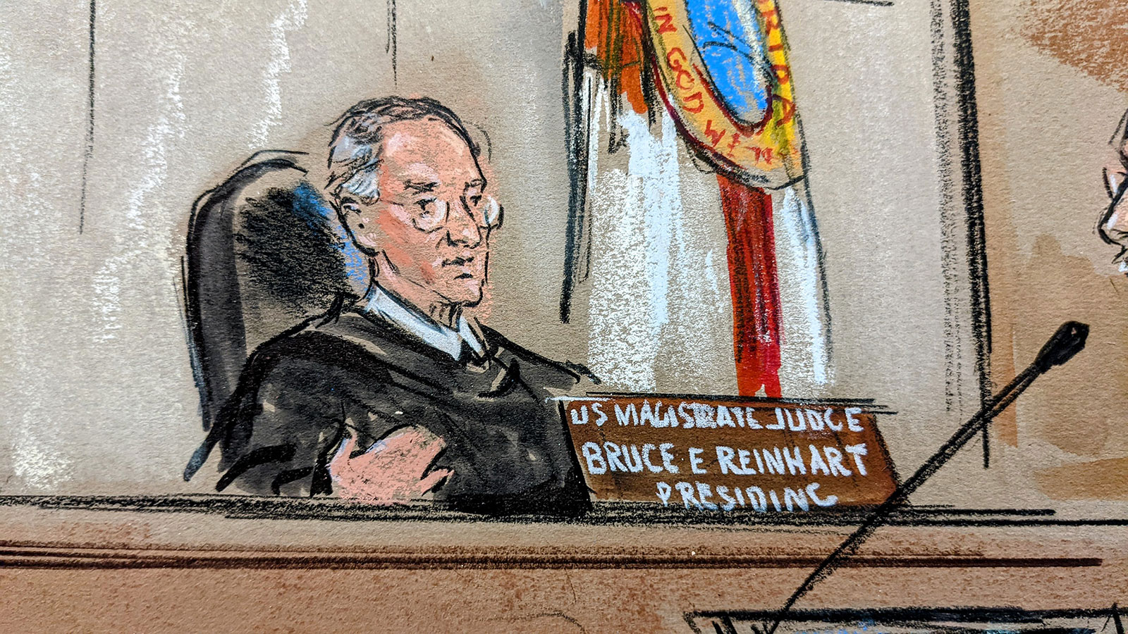 US Magistrate Judge Bruce Reinhart presides over the hearing.
