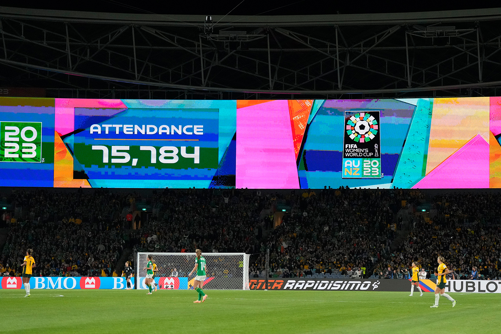 Screens show the attendance number of the match between Australia and Ireland on July 20. 