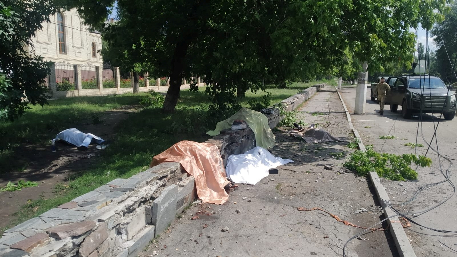 Bodies of people killed in the town of Toretsk in the Donetsk region, Ukraine, on August 4.