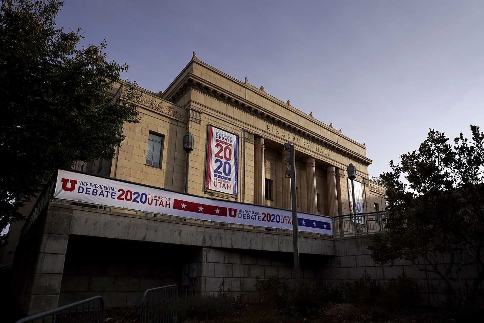 Banners hang from the outside of Kingsbury Hall ahead of the vice presidential debate between Republican Vice President Mike Pence and Democratic nominee Kamala Harris on Friday at the University of Utah in Salt Lake City.