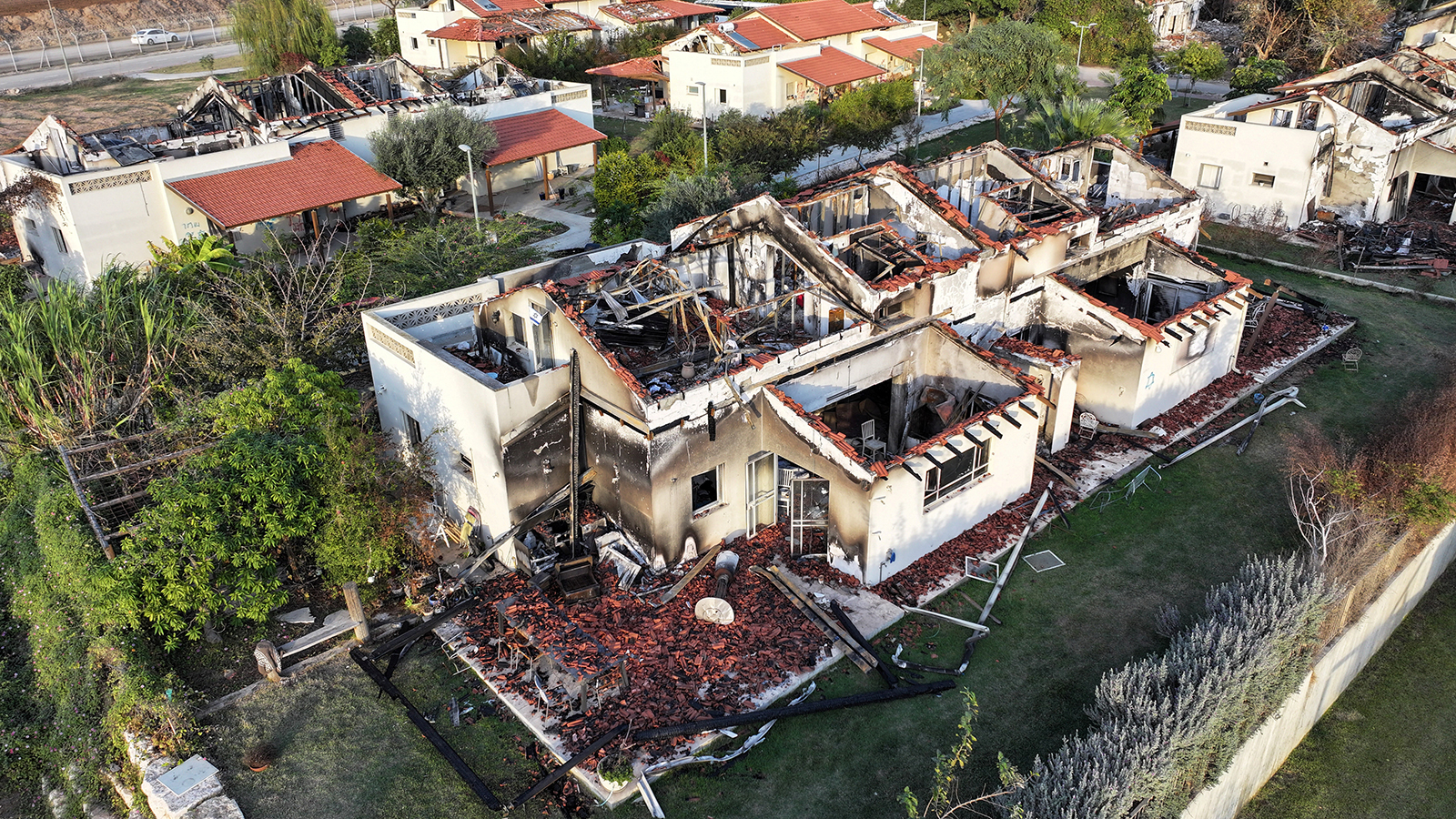 Damaged houses are seen, following the deadly October 7 attack by gunmen from Palestinian militant group Hamas, in Kibbutz Beeri in southern Israel, on November 28, 2023.
