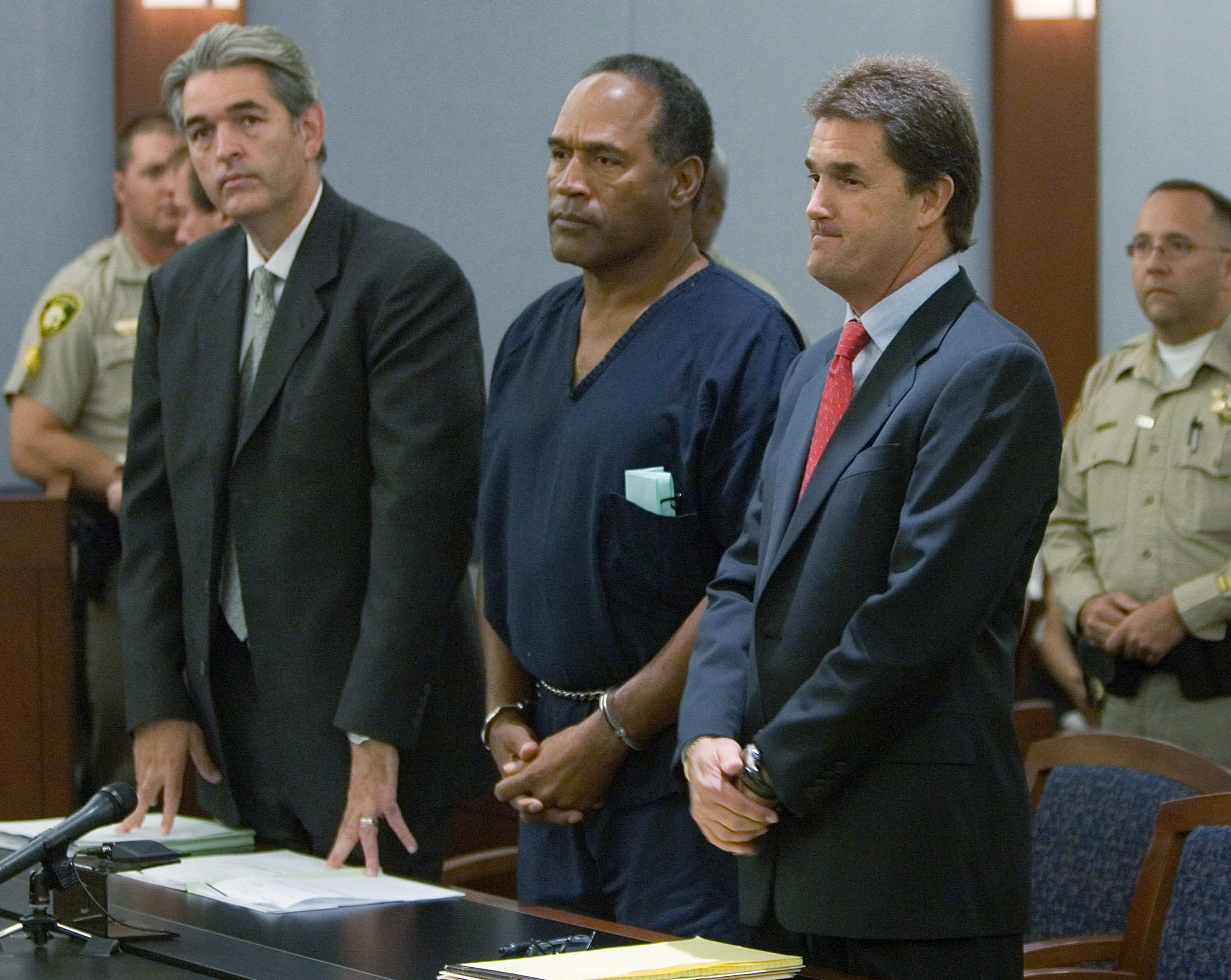 O.J. Simpson, center, appears in court on charges which include kidnapping, armed robbery and assault, in Las Vegas, Nevada, in September 2007. 