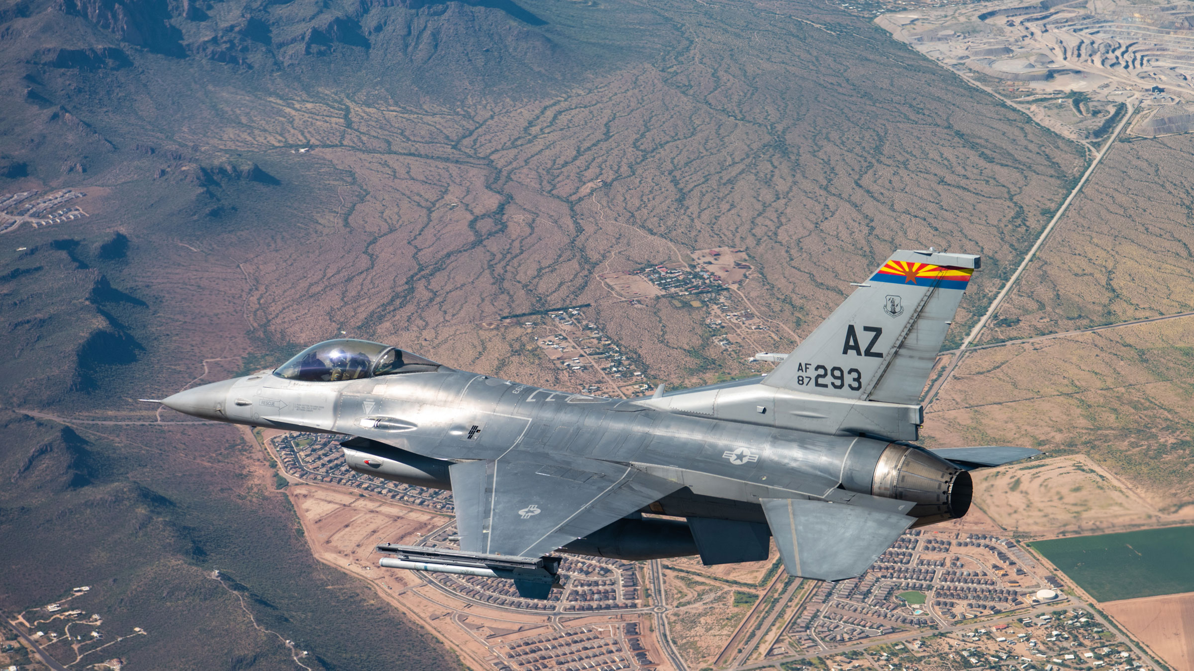 An F-16 assigned to the 162nd Fighter Wing flies over Tucson, Arizona, during a training mission in 2022.