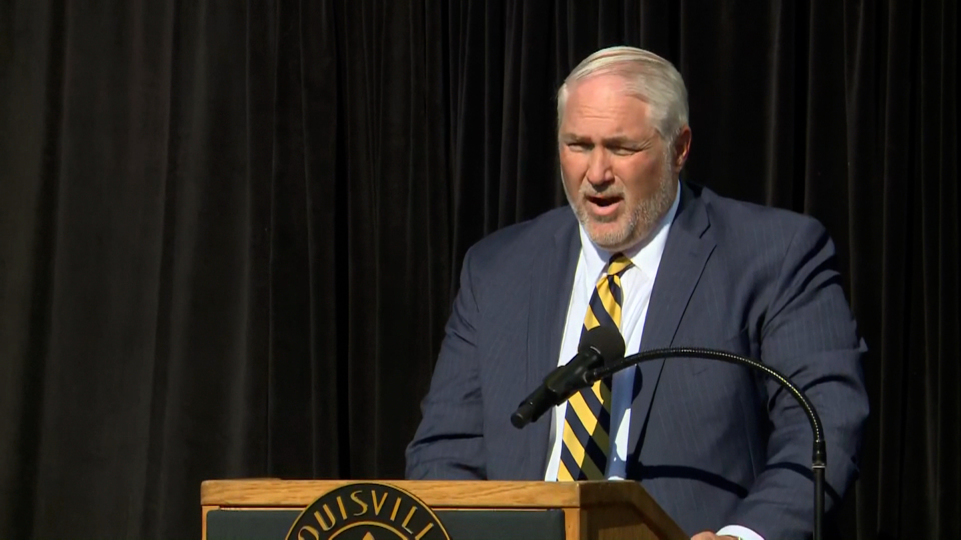 Old National Bank CEO Jim Ryan speaks during a vigil in Louisville on Wednesday. 