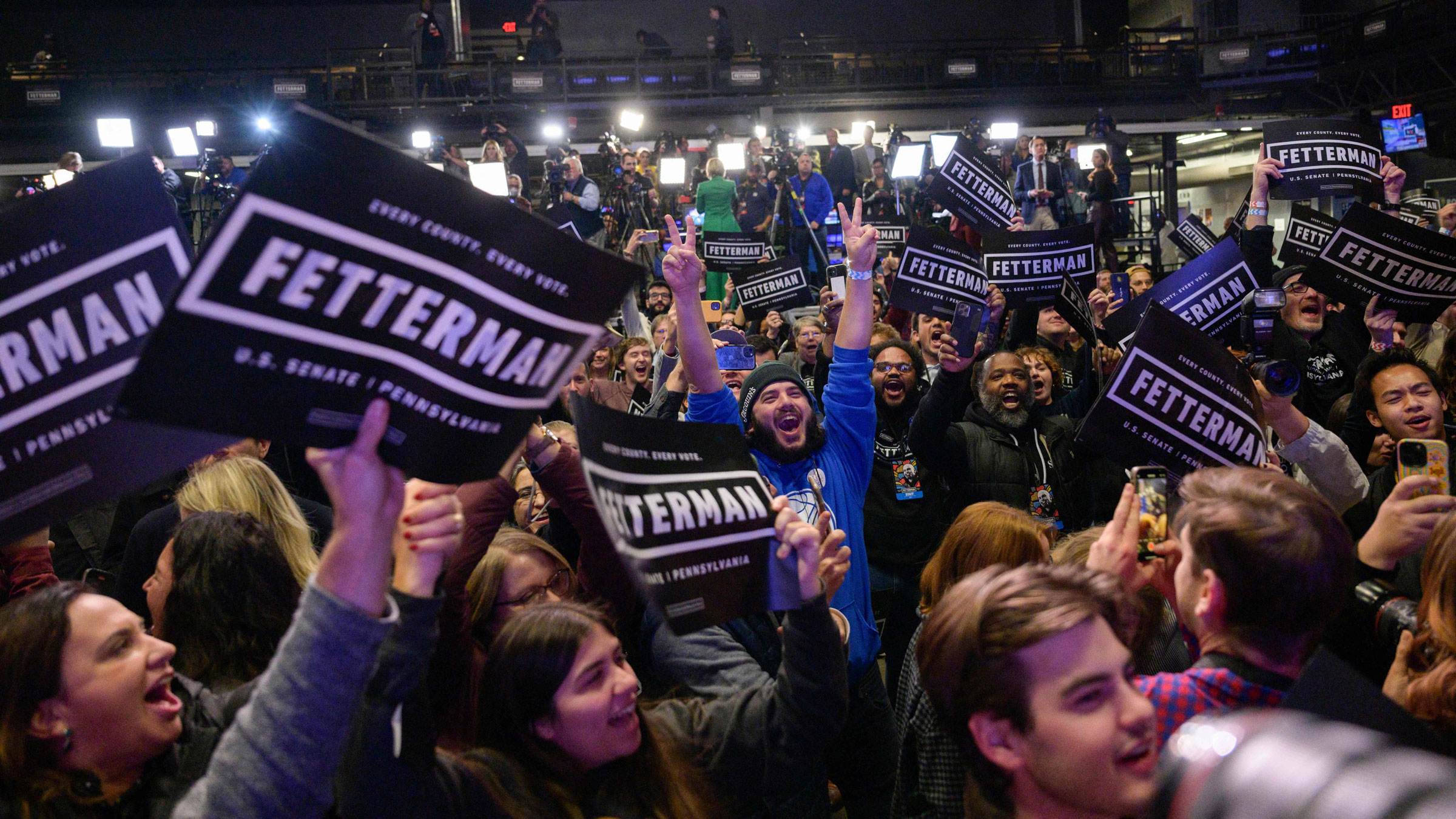Fetterman supporters celebrate in Pittsburgh.