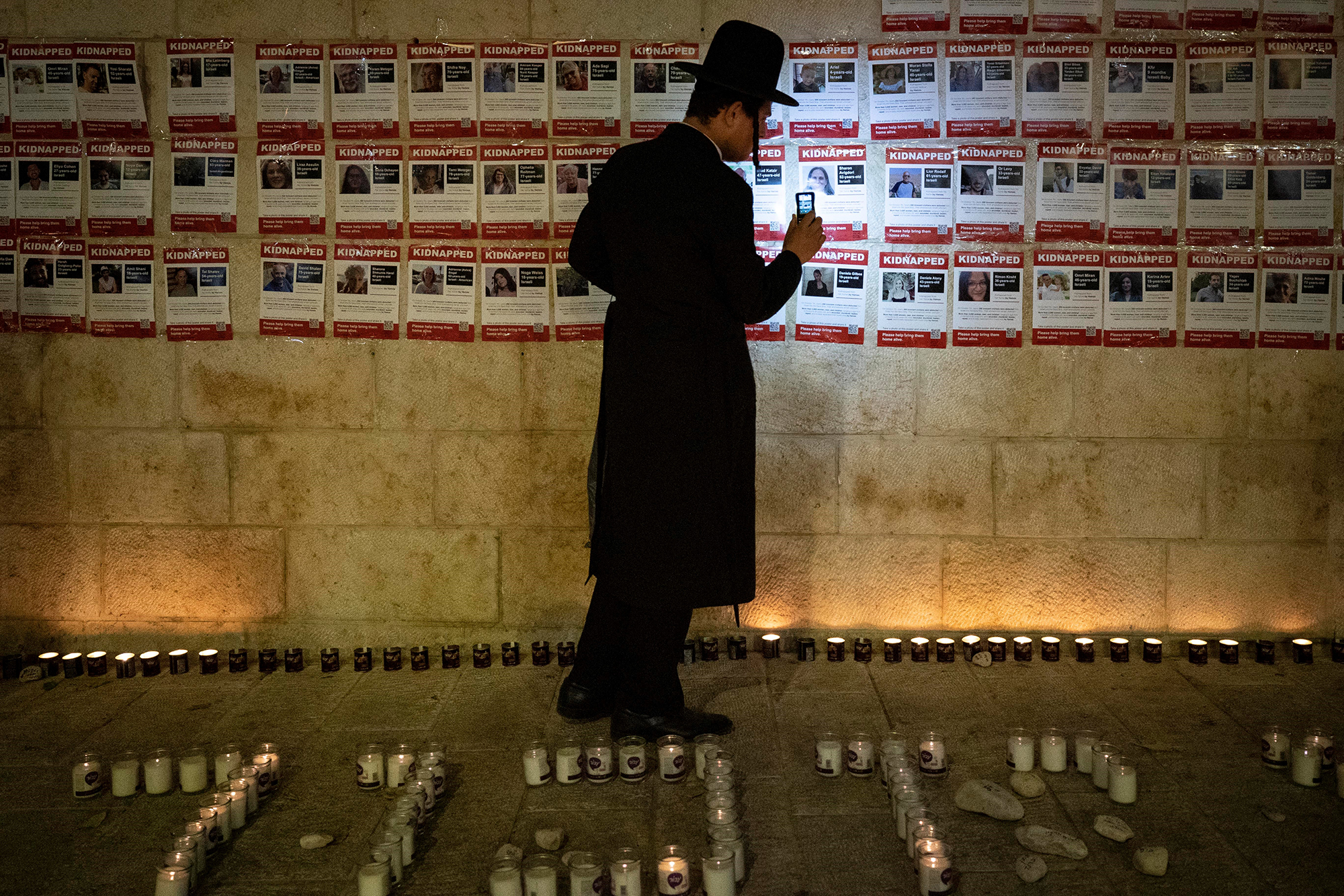 Posters of Israeli hostages held in the Gaza Strip are pictured in Jerusalem on November 5.