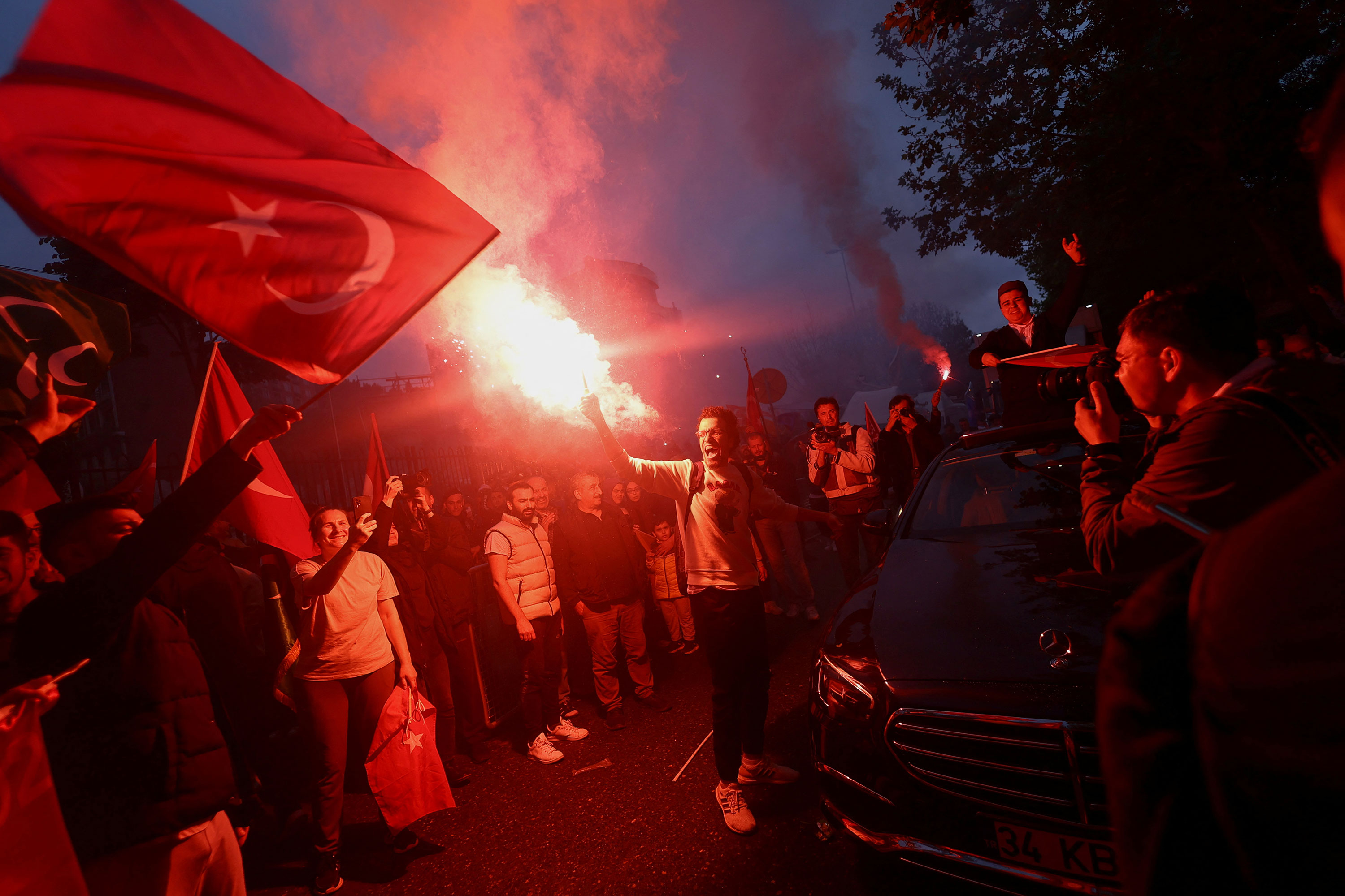 Erdogan supporters celebrate outside the AKP headquarters in Istanbul on May 28. 