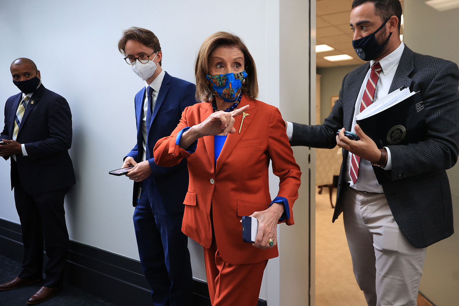 House Speaker Nancy Pelosi walks through the halls of the US Capitol on Wednesday.