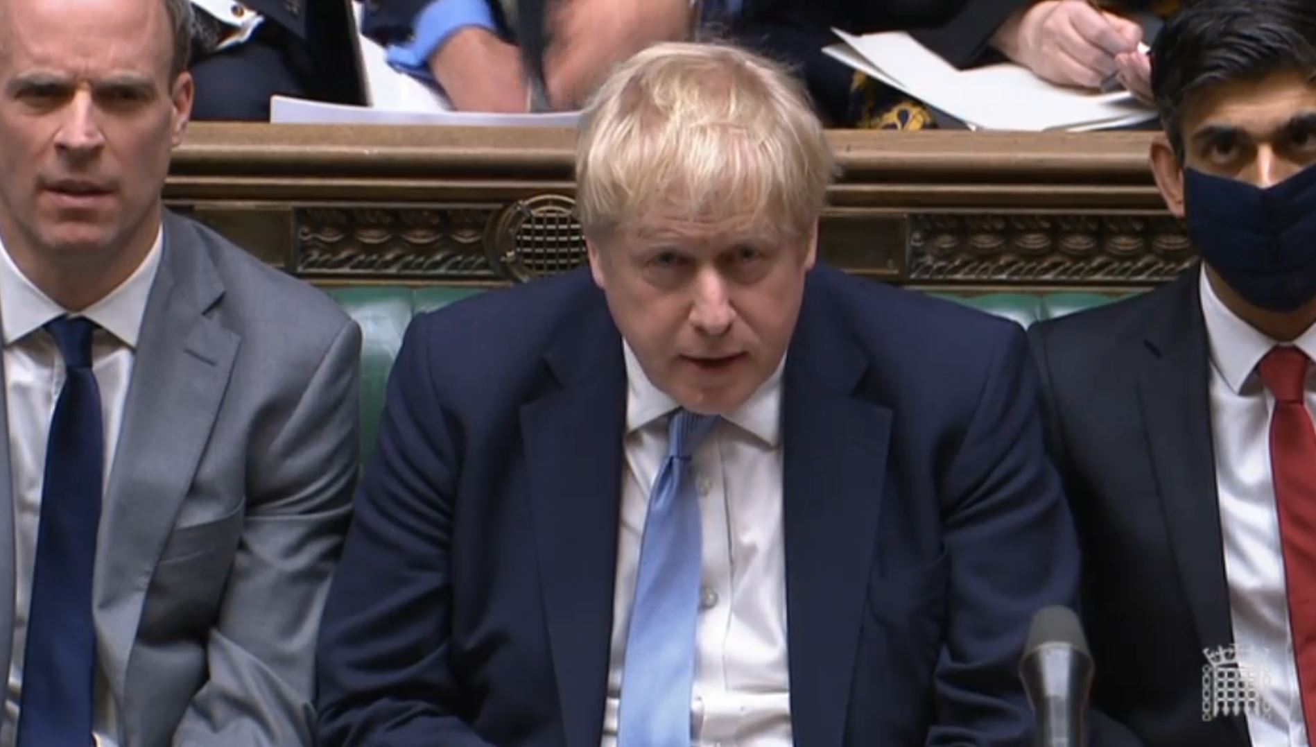 Prime Minister Boris Johnson listens as Labour leader Sir Keir Starmer responds to his statement to MPs in the House of Commons on the Sue Gray report on January 31.