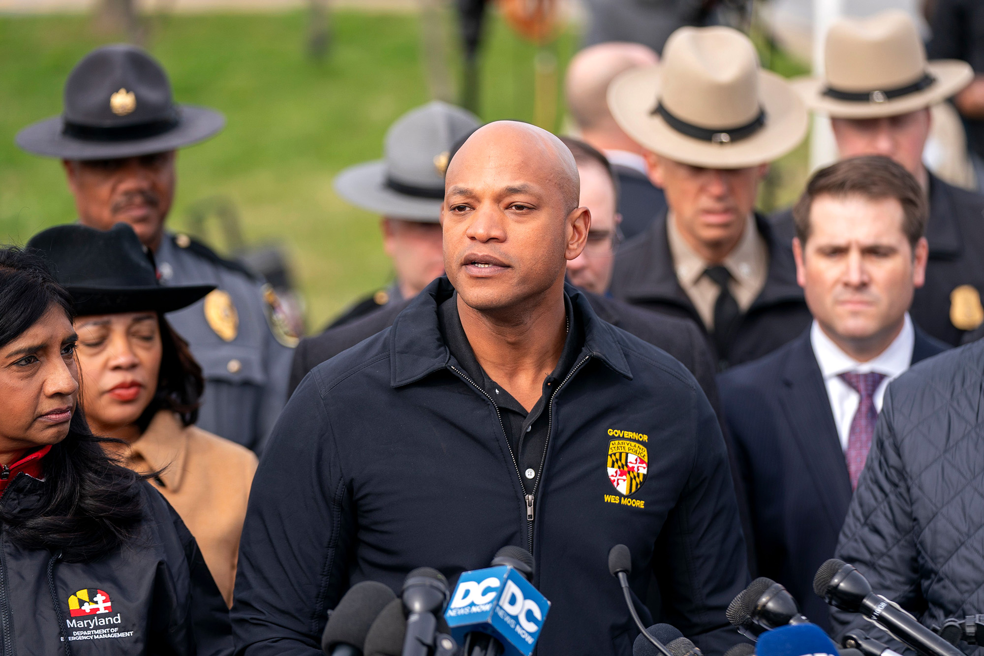 Maryland Governor Wes Moore, center, addresses a press conference at the scene of the Francis Scott Key Bridge collapse in Baltimore, Maryland, on March 26. 