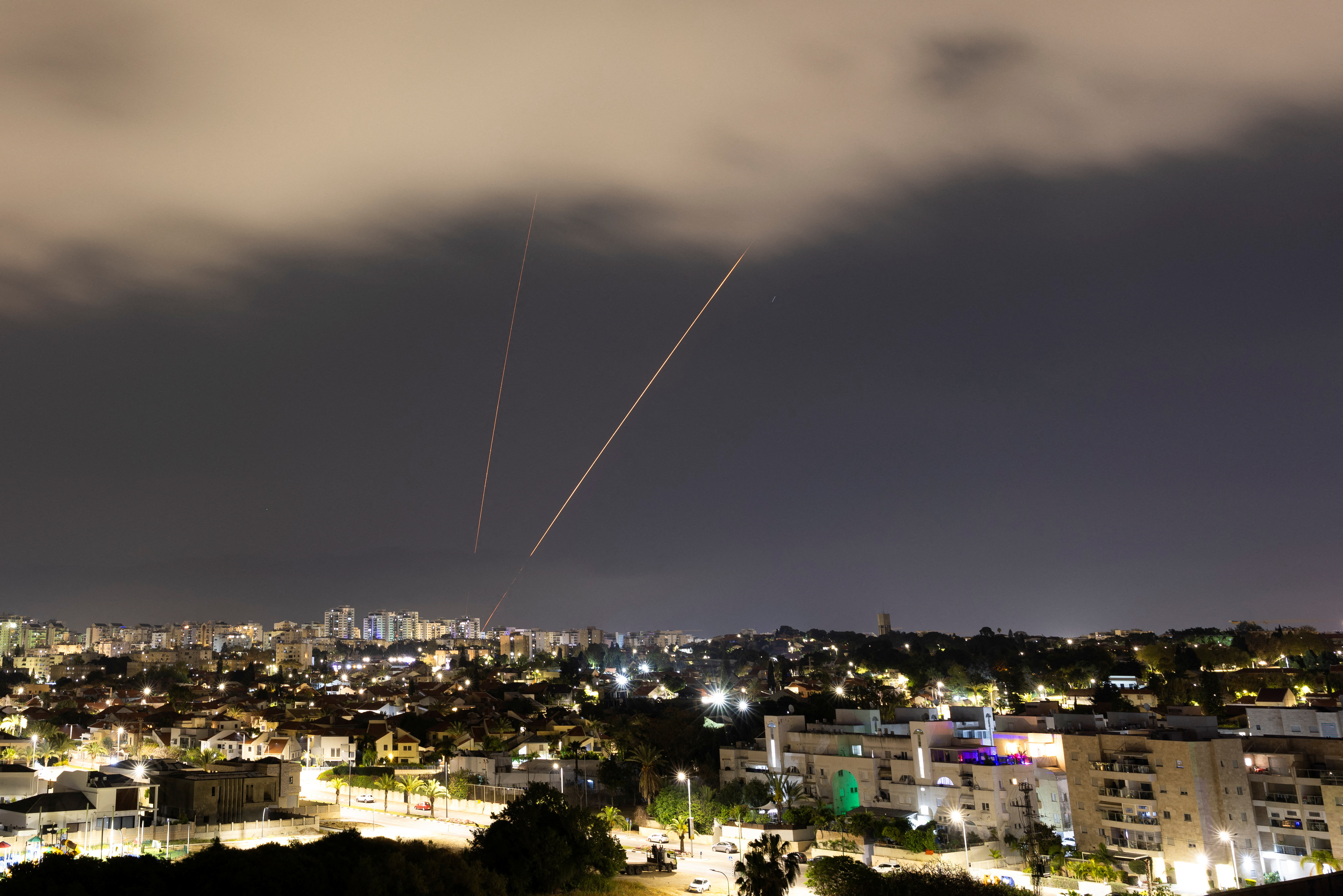 An anti-missile system operates after Iran launched drones and missiles towards Israel, as seen from Ashkelon, Israel, on April 14. 