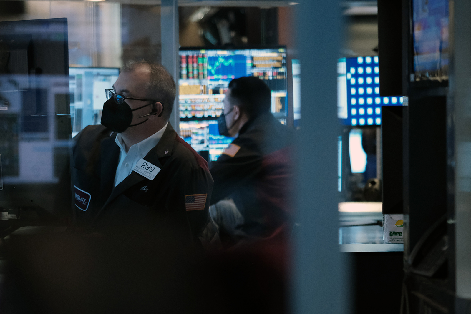 Traders work on the floor of the New York Stock Exchange on January 26.