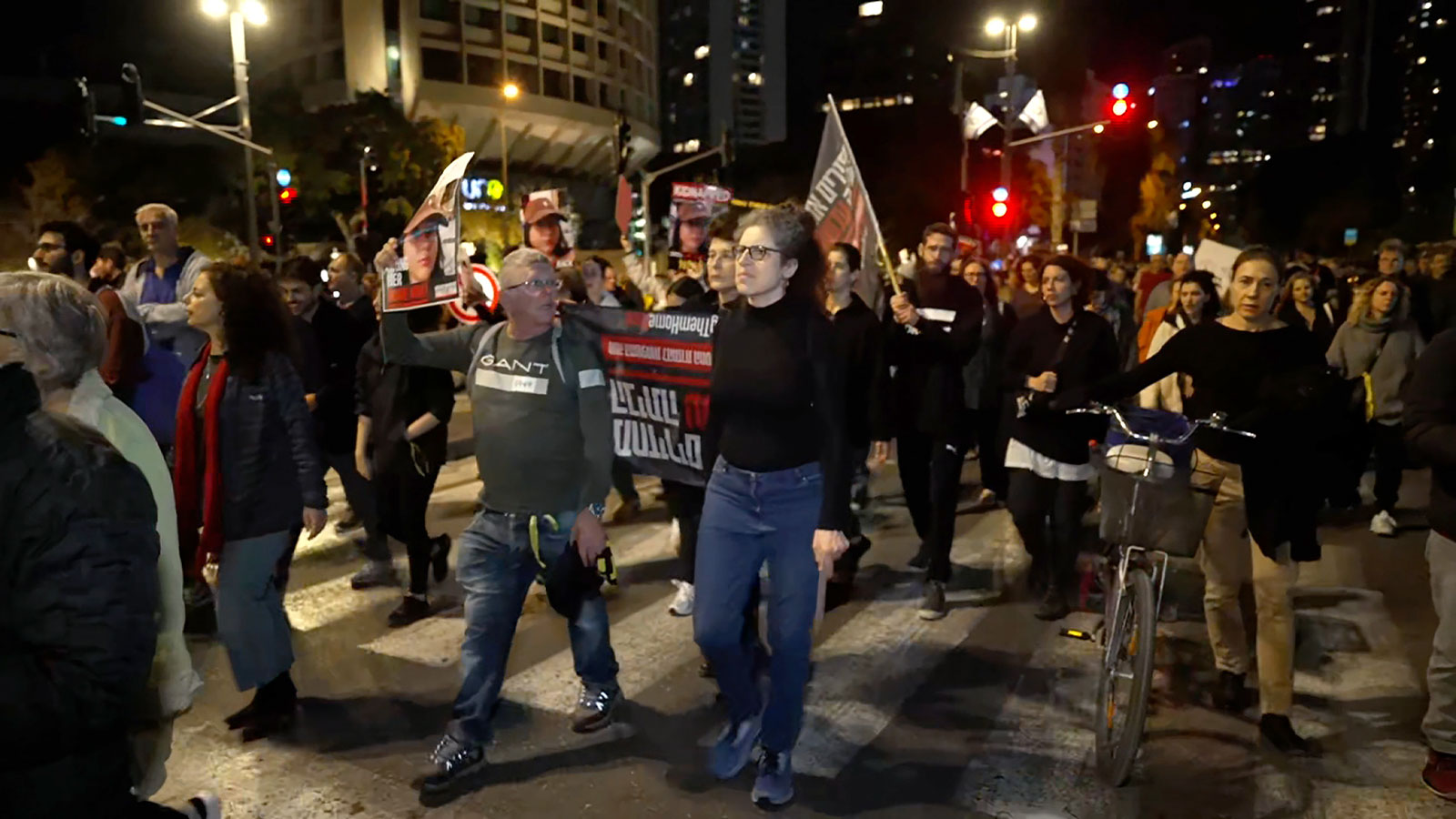 Several dozen people protest in Tel Aviv on Friday, December 15. 