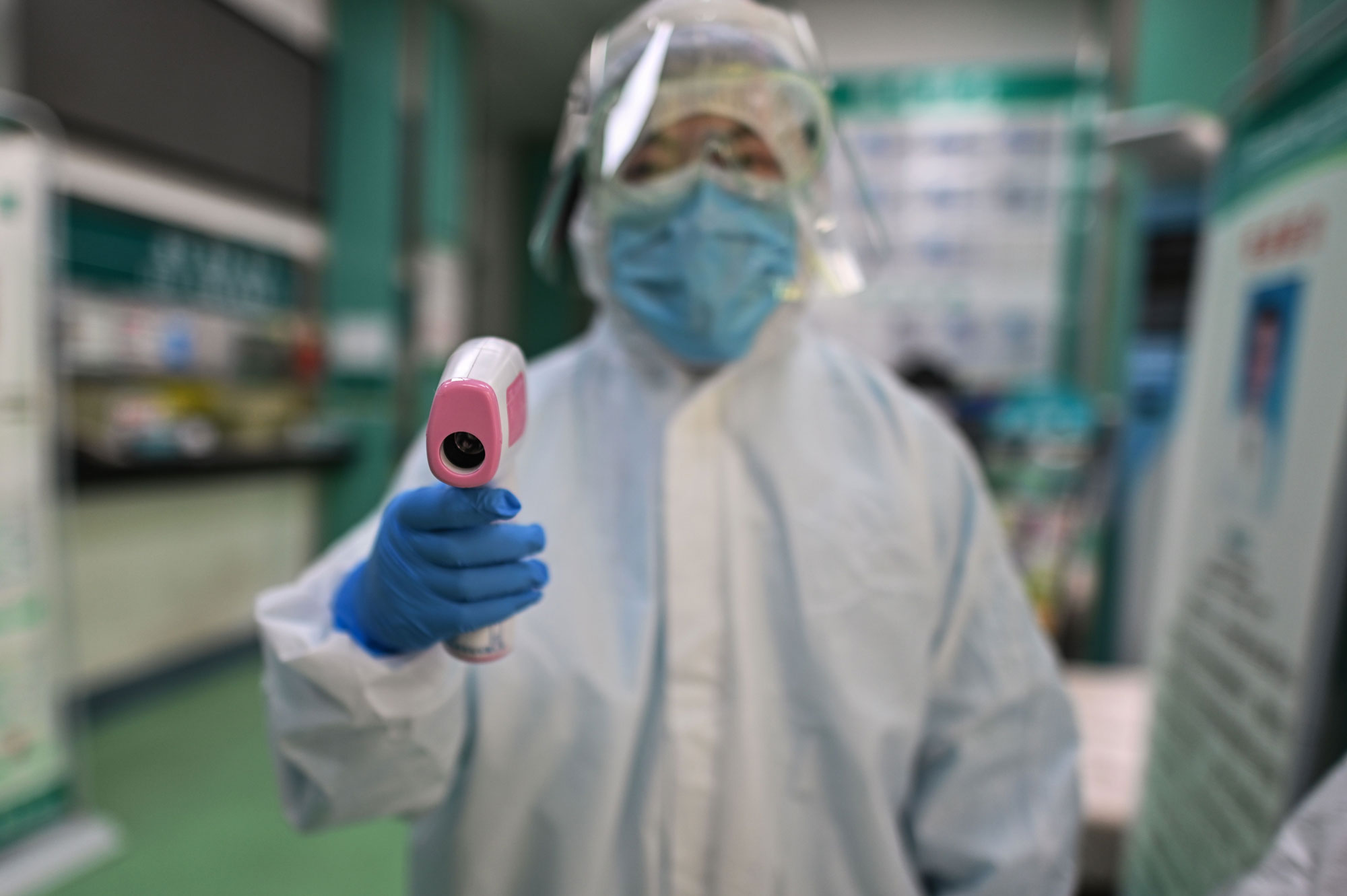 A medical worker prepares to administer a coronavirus test in Wuhan in China's central Hubei province on April 16. 