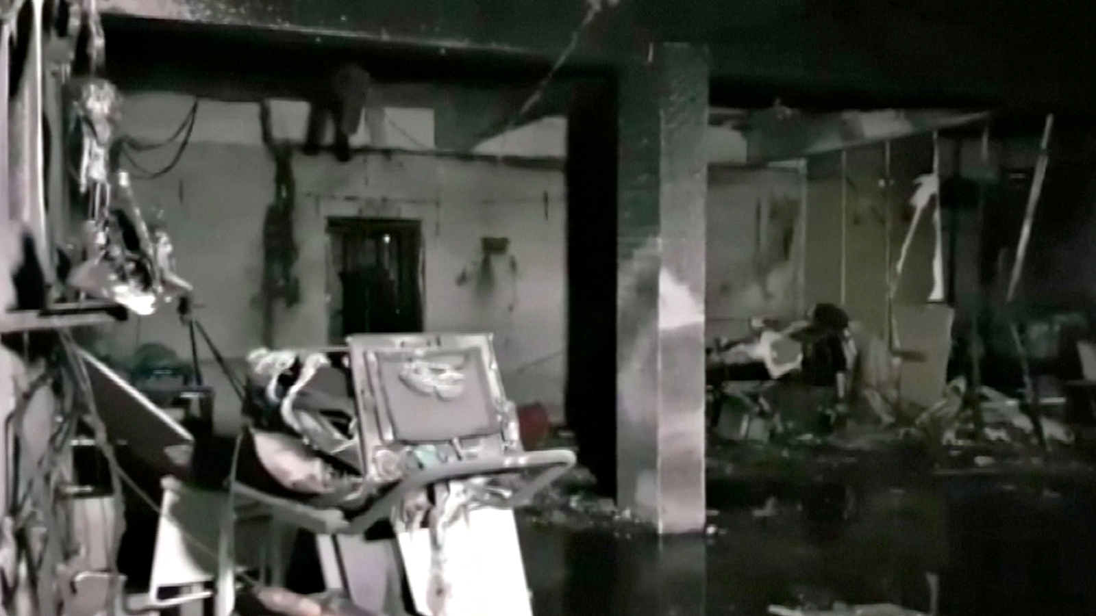 Damaged equipment and furniture are seen in the burnt interior of a hospital treating coronavirus patients, after a deadly fire, in India's western Gujarat state, May 1, in this still image obtained from video.