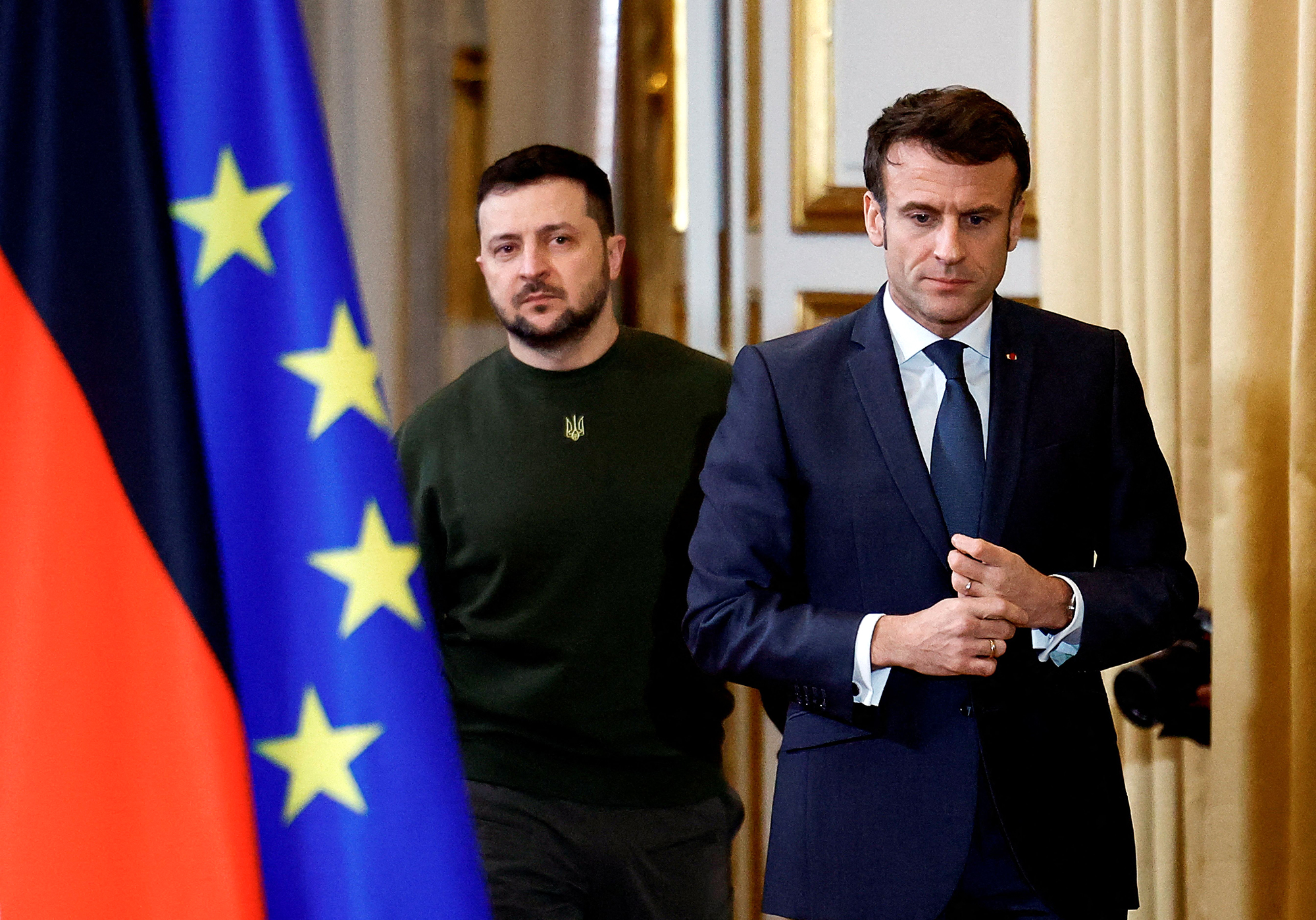 Ukrainian President Volodymyr Zelensky and French President Emmanuel Macron arrive for a joint press conference in Paris, on February 8. 