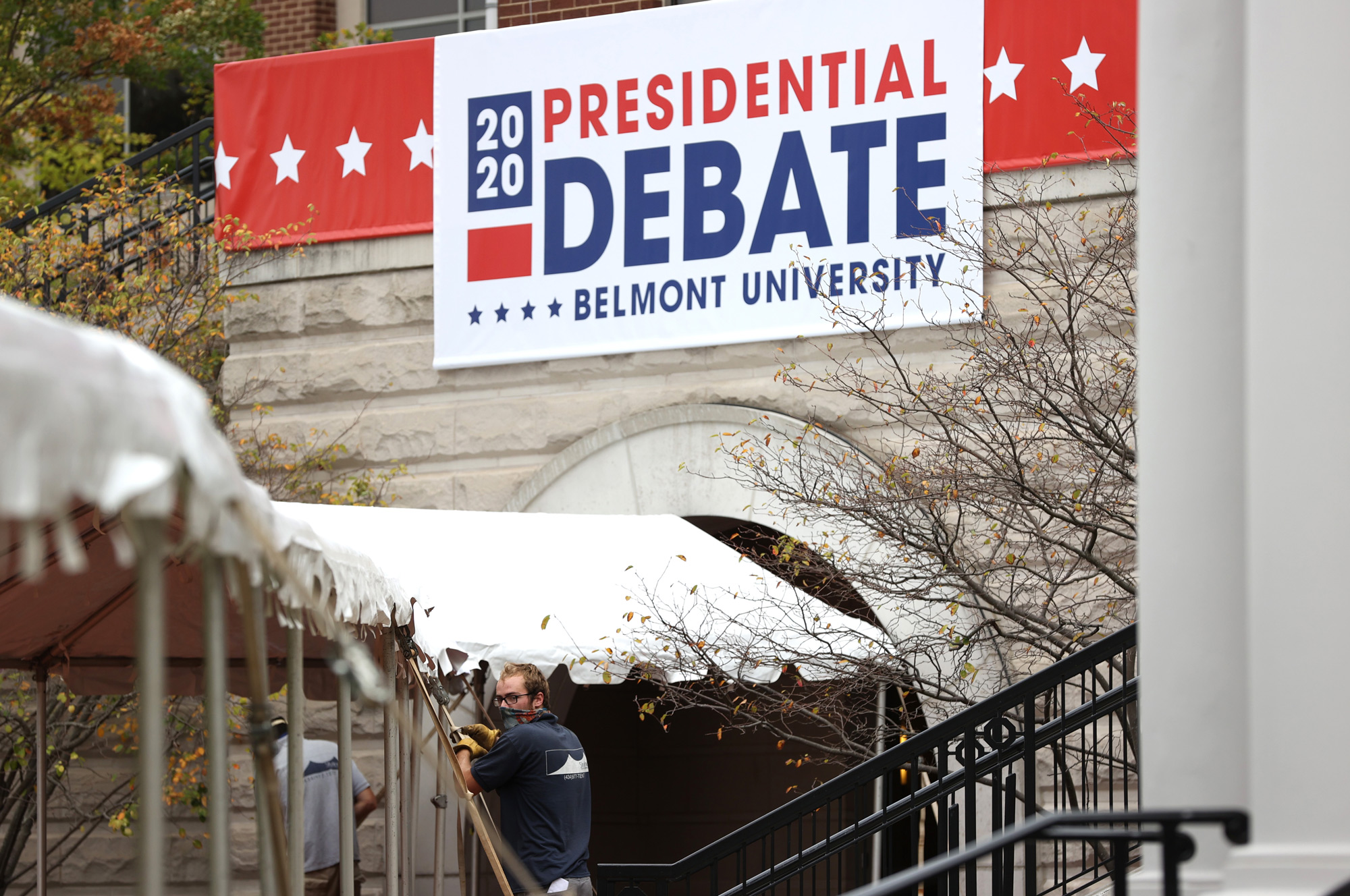 Workers set up a tent outside of the Curb Event Center at Belmont University on October 19 in Nashville, Tennessee. 