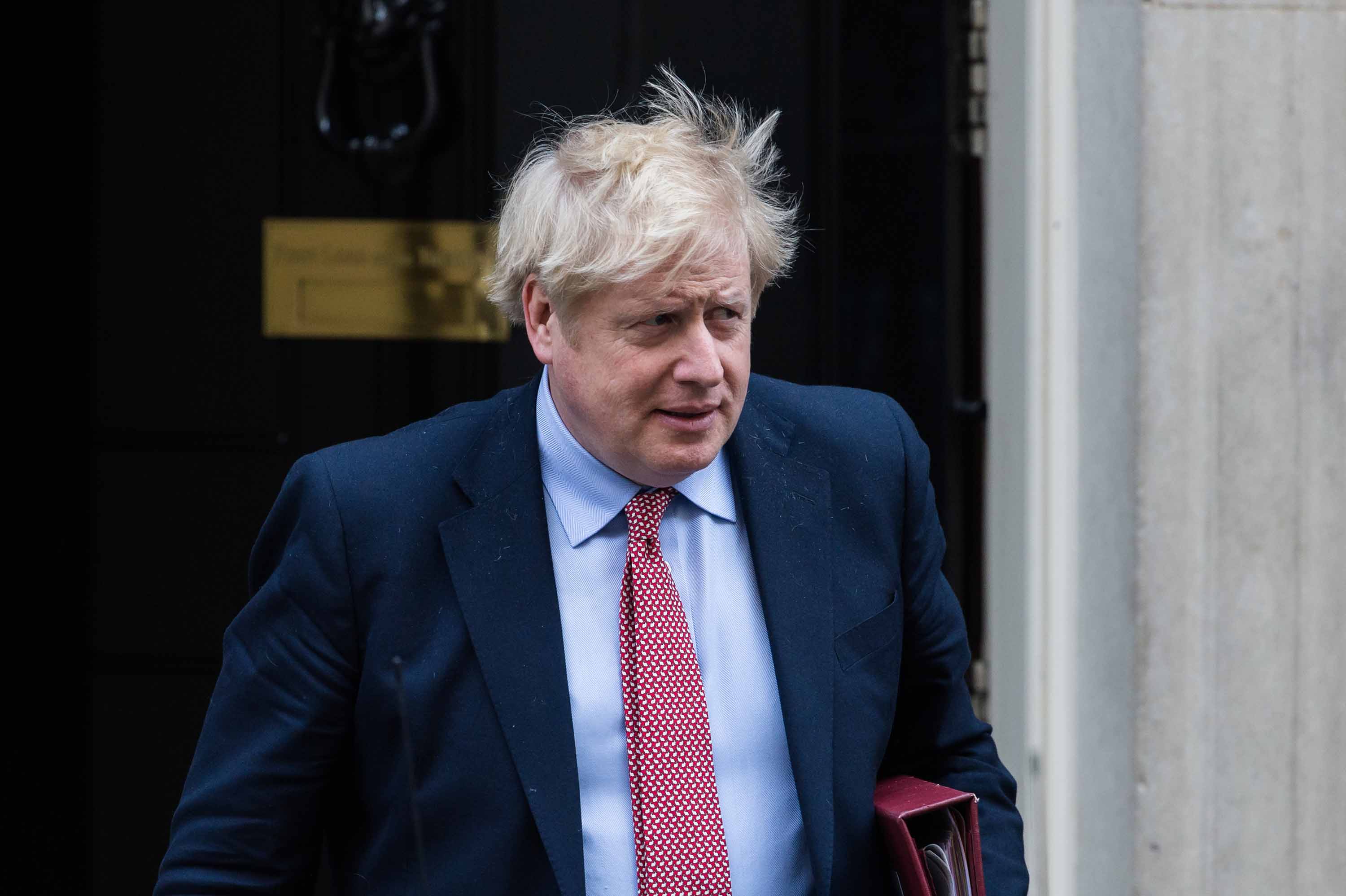 British Prime Minister Boris Johnson leaves 10 Downing Street on March 25.