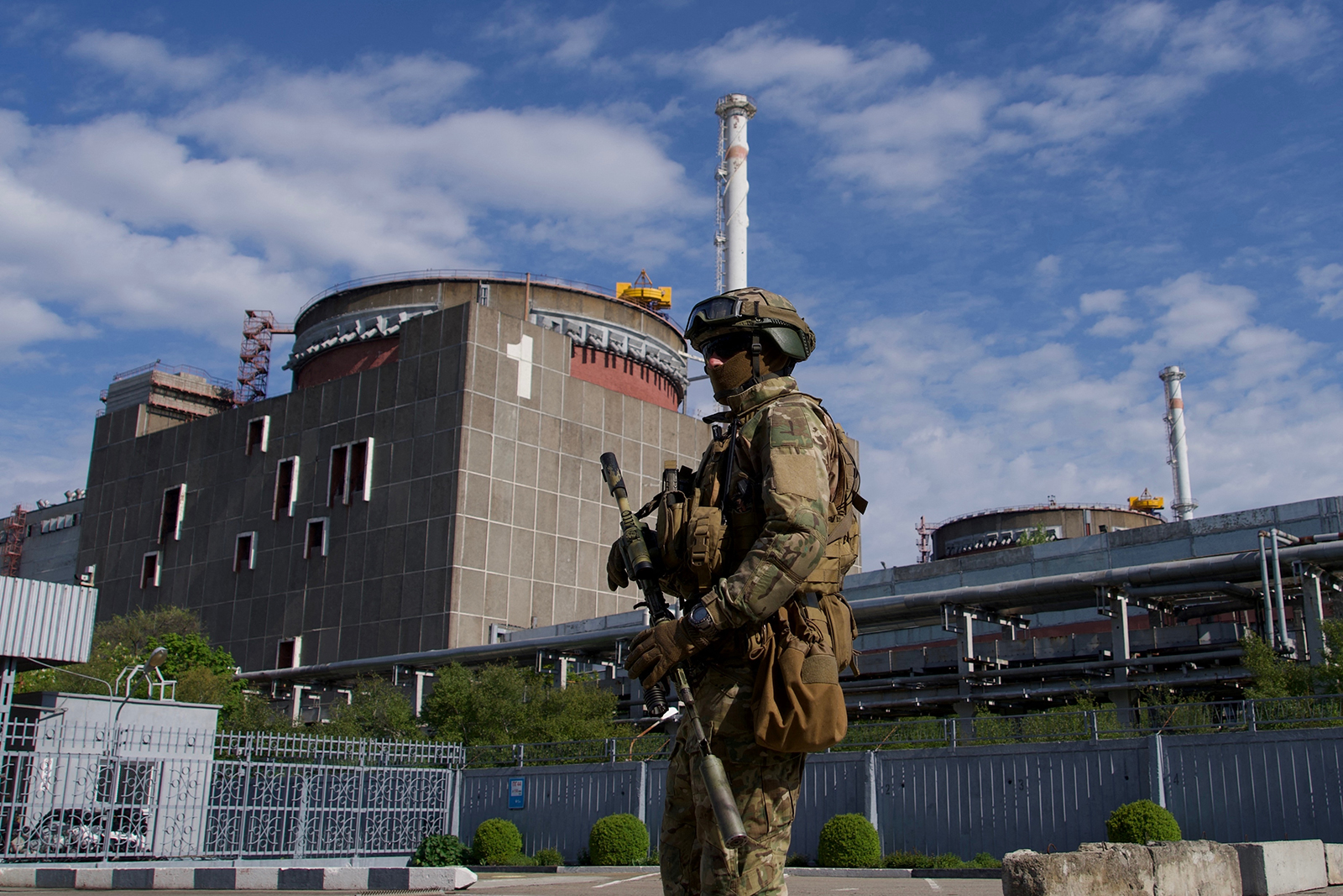 A Russian serviceman patrols the territory of the Zaporizhzhia nuclear power plant in Energodar on May 1, 2022. 
