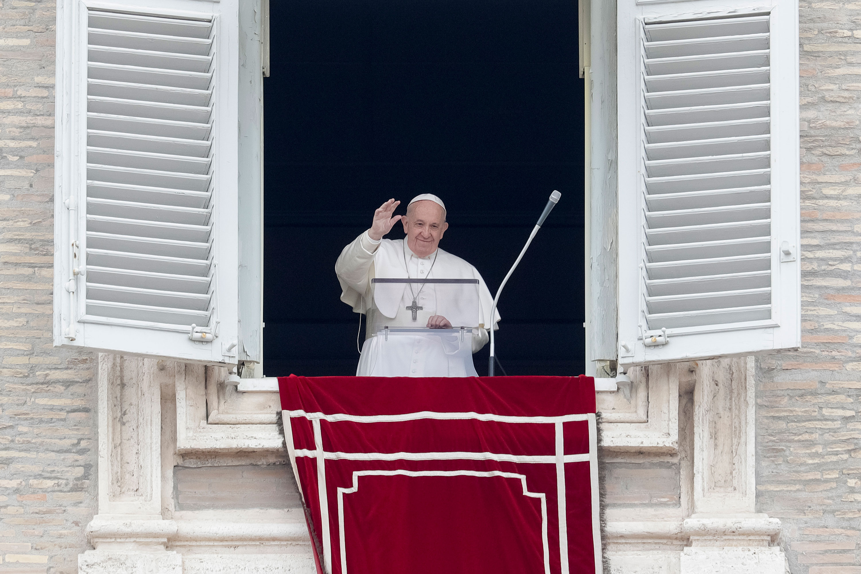 Pope Francis delivers his blessing as he recites the Angelus prayer in St. Peter's Square in this file photo from March 1. 