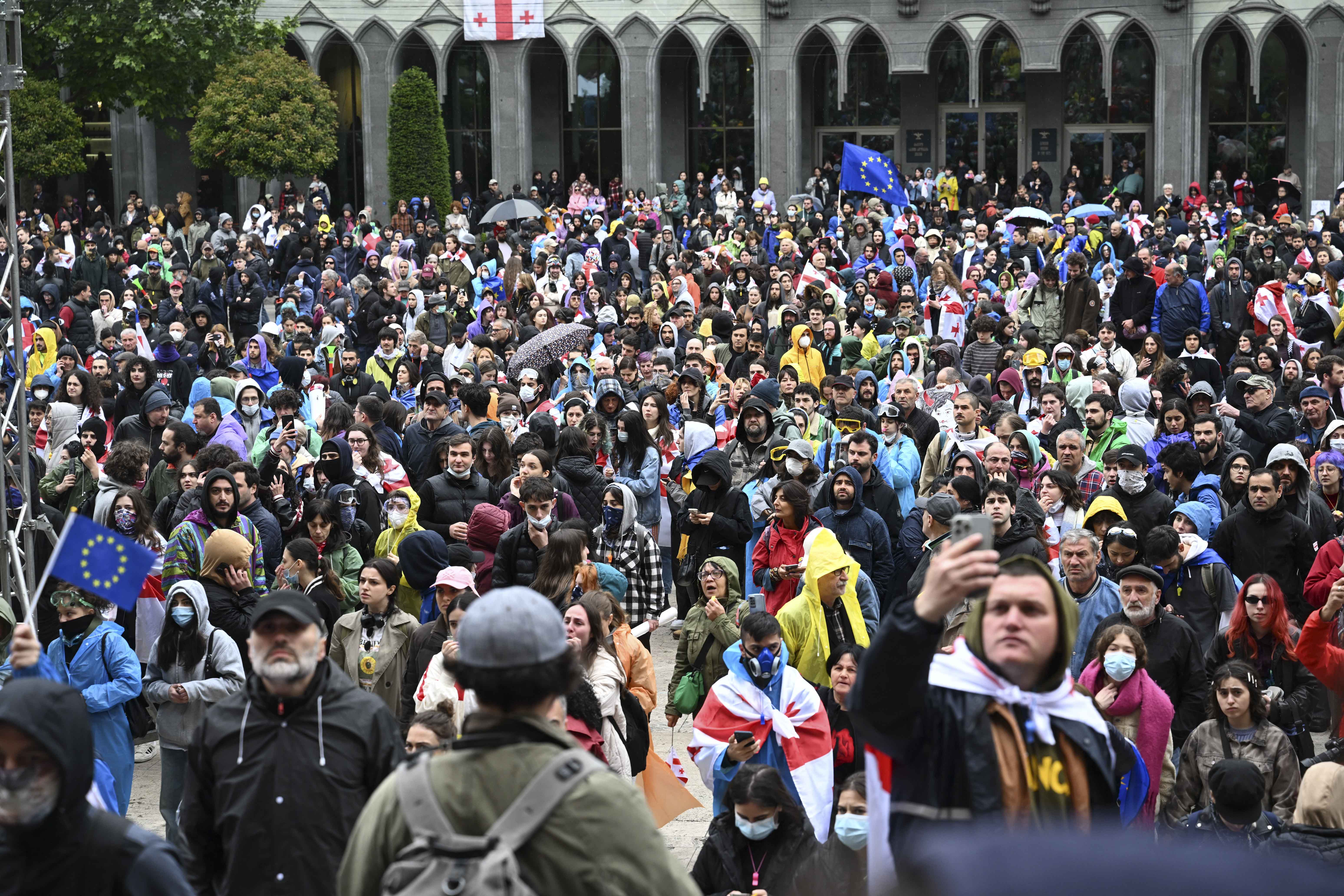 Protesters rally against the "foreign influence" bill in front of the parliament in Tbilisi on Tuesday. 