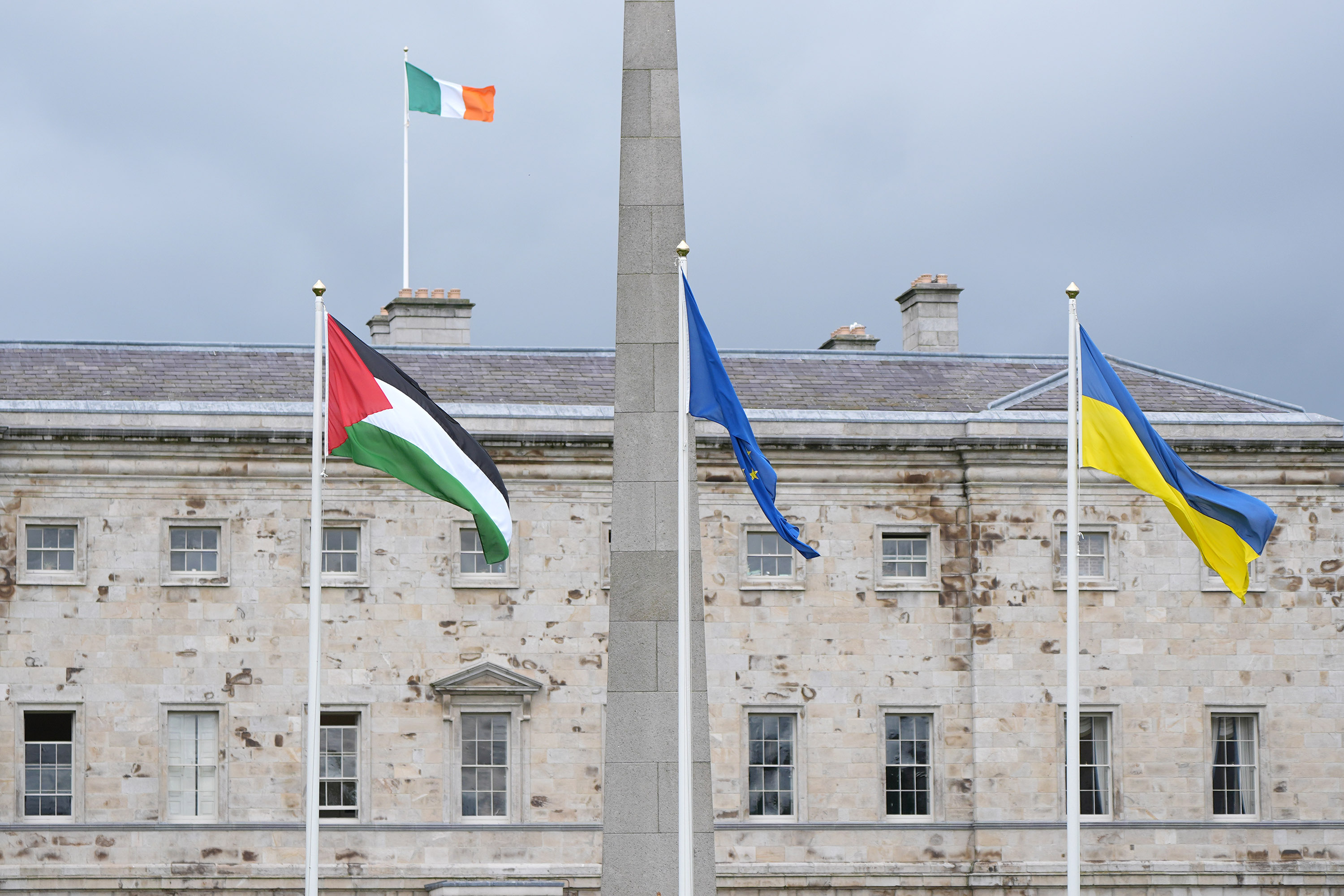 A Palestinian flag, left, flies outside Leinster House in Dublin, following the decision by the Irish government to formally recognize the State of Palestine, on May 28.