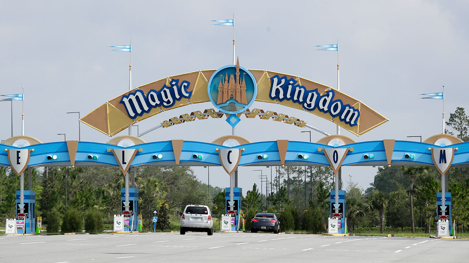 Park guests arrive at Walt Disney World in Lake Buena Vista, Florida, on Saturday, July 11.